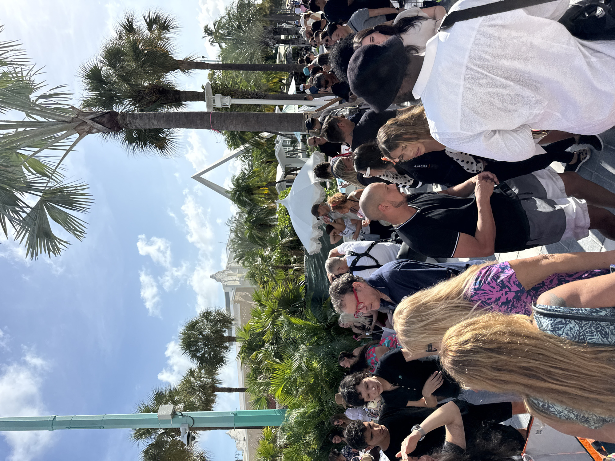 Street musician draws crowds during evening performance in Miami Beach