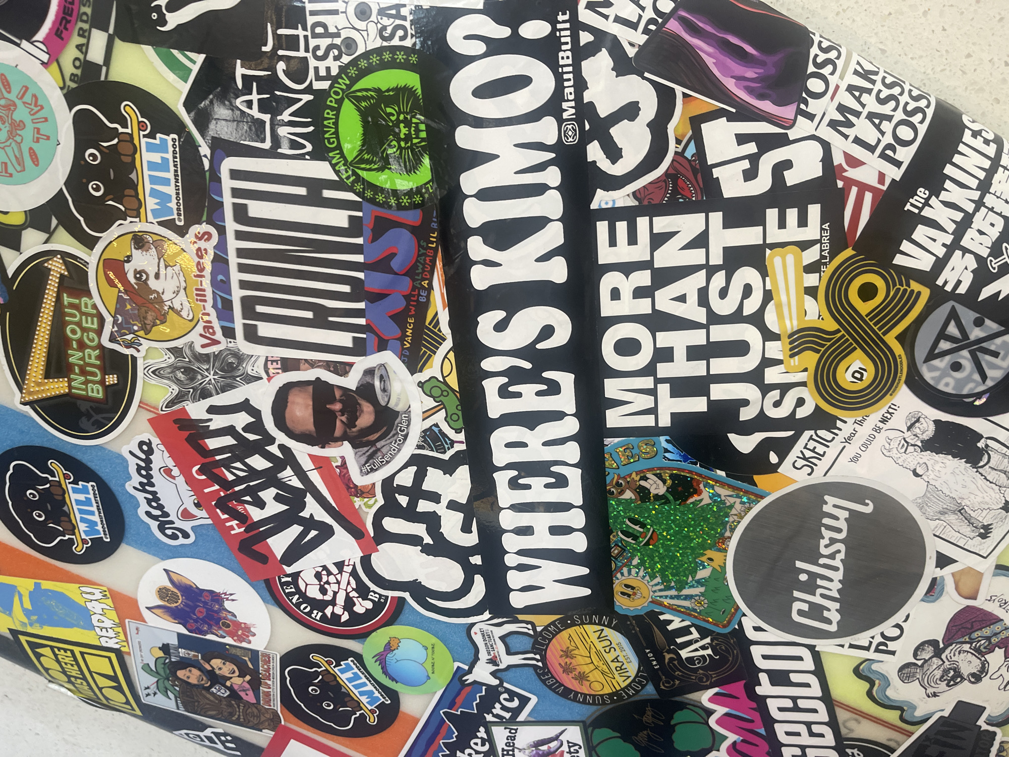 Sticker-covered surfboards documented at Los Angeles taco restaurant