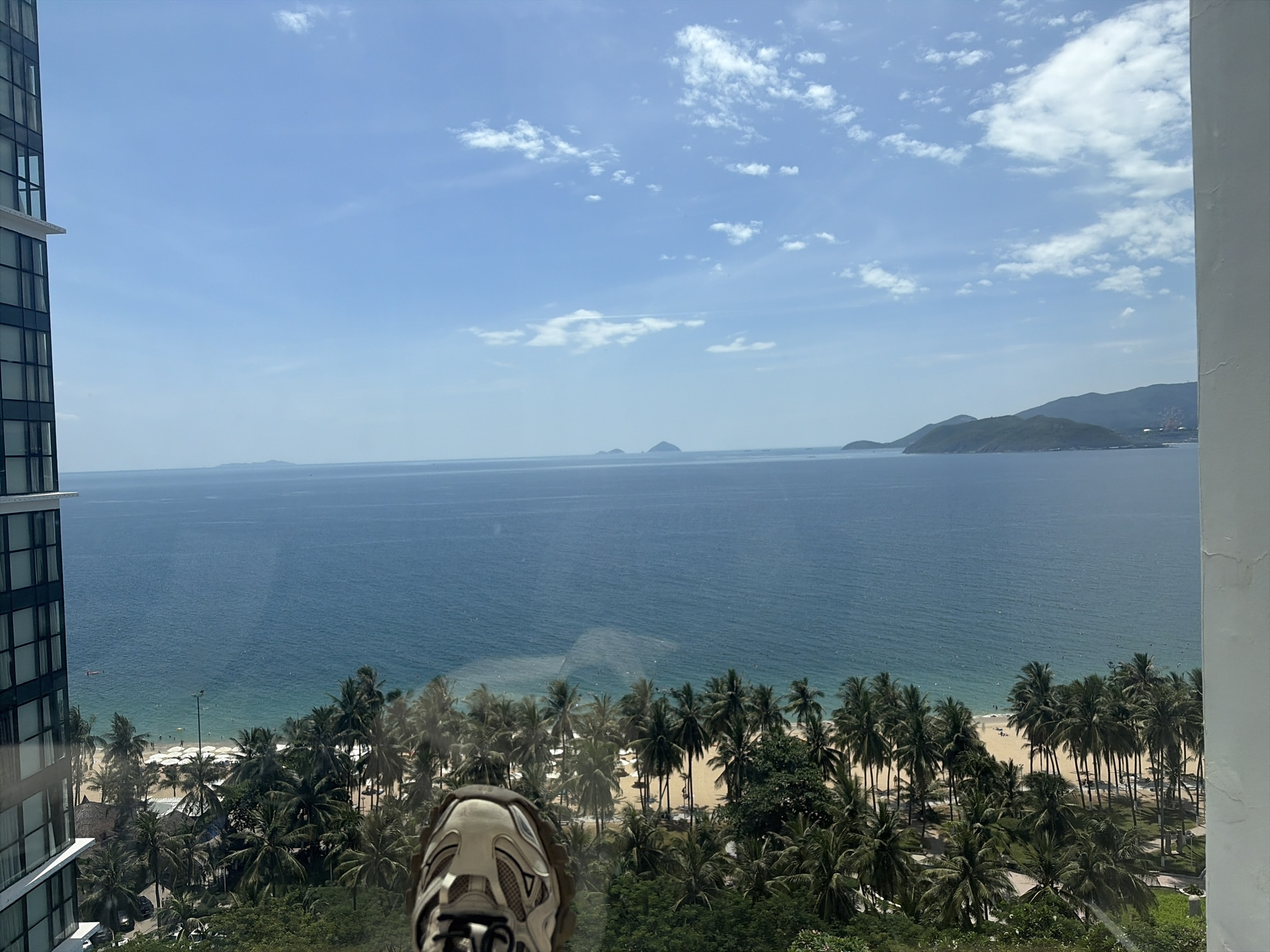 Inside a Nha Trang spa with coastal views and eclectic decor