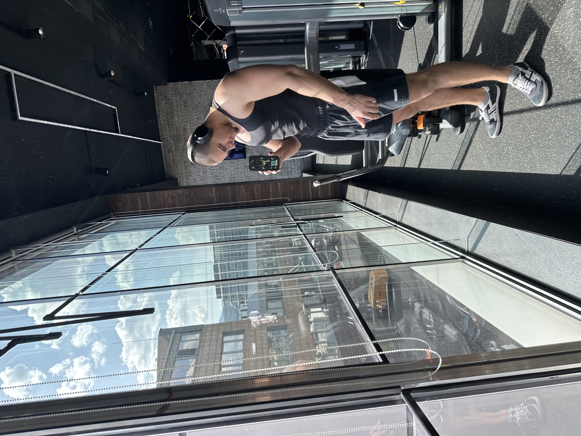 Man checks smartphone at Sofia gym facility