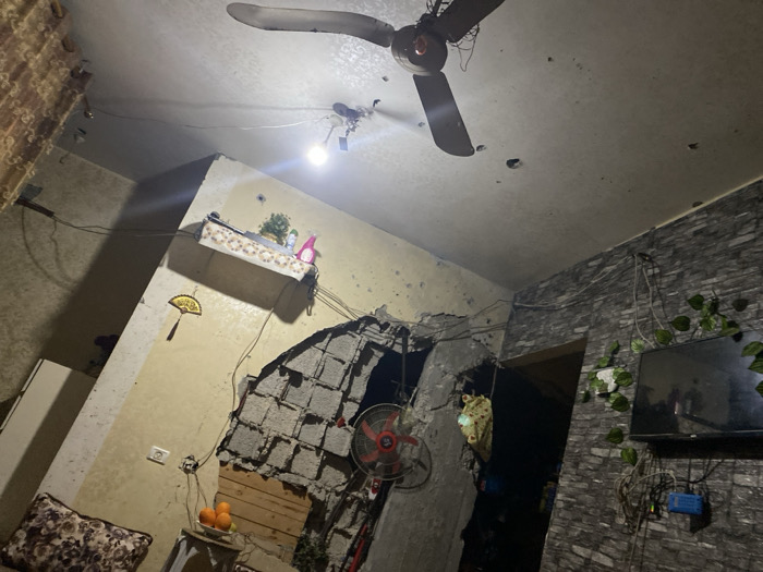 Damaged residential interiors documented in Khan Yunis