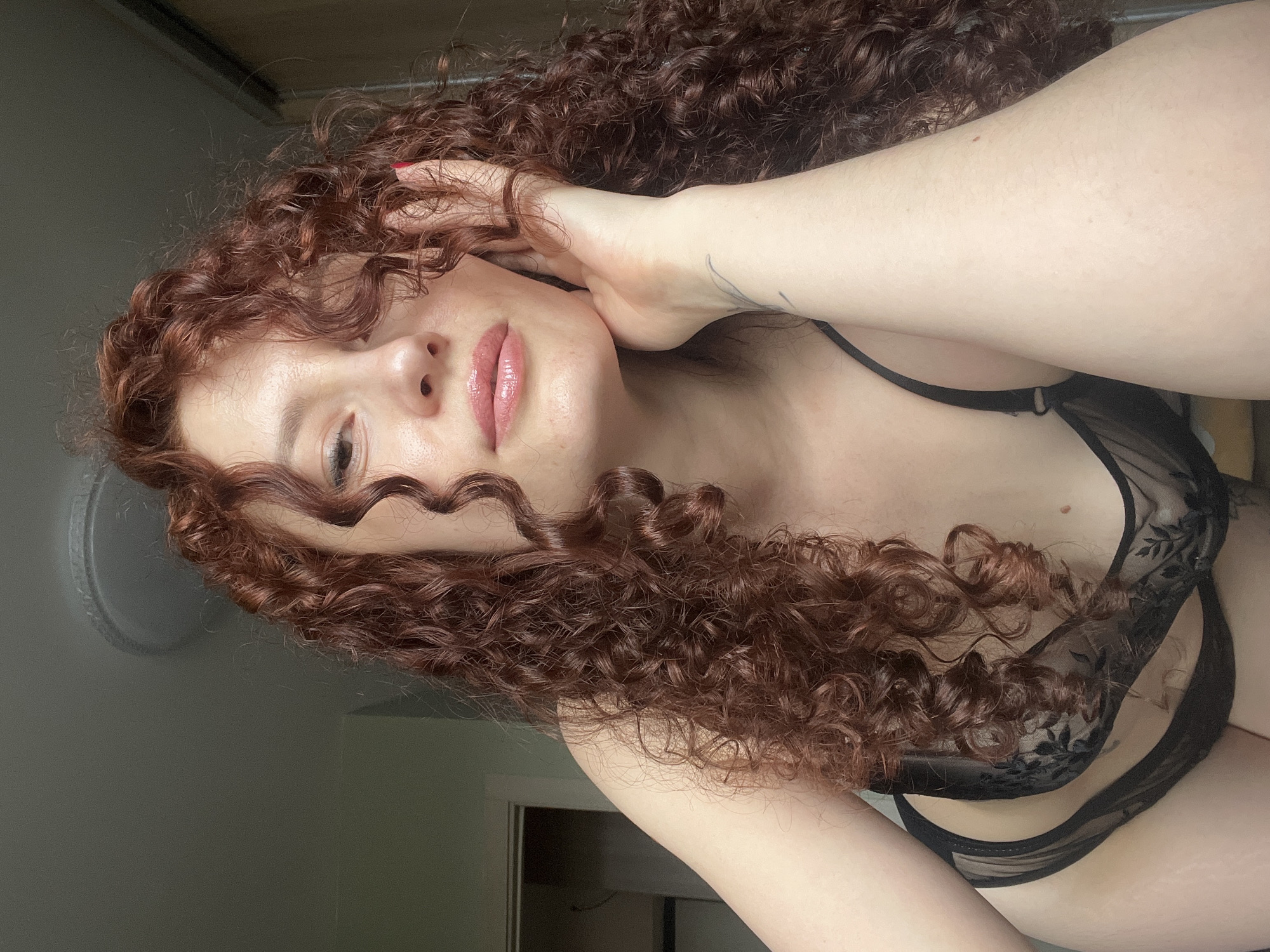 Person photographed in lingerie in Saint Petersburg indoor setting