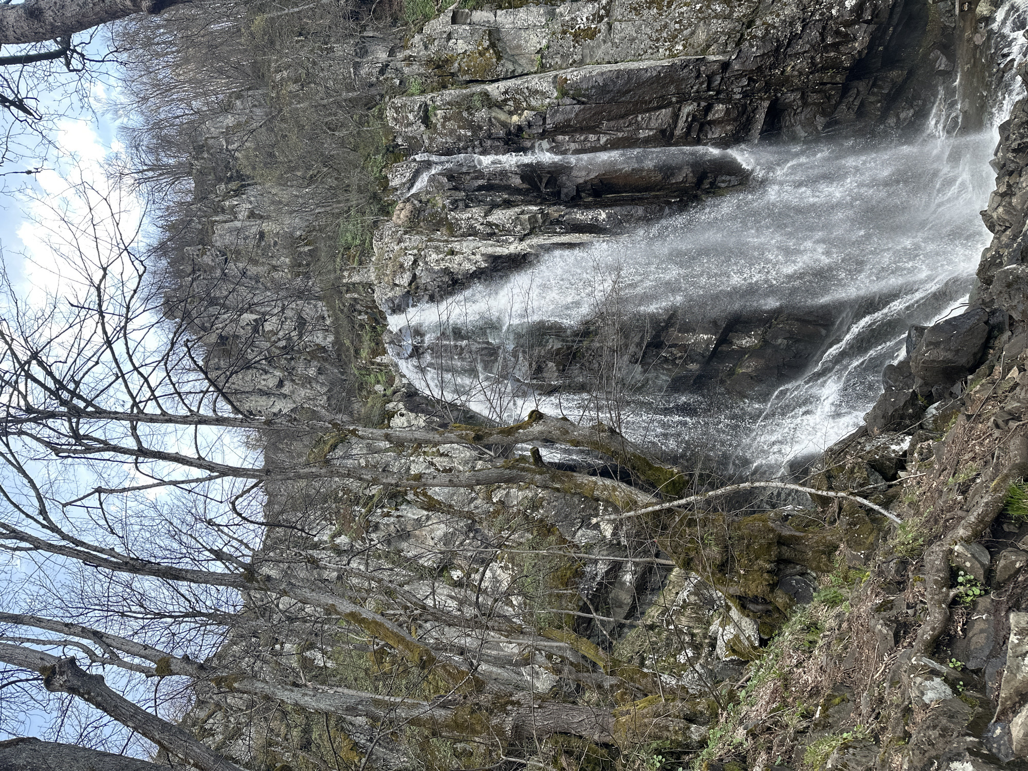 Witness documents waterfall cascade over rocky terrain in two-minute span