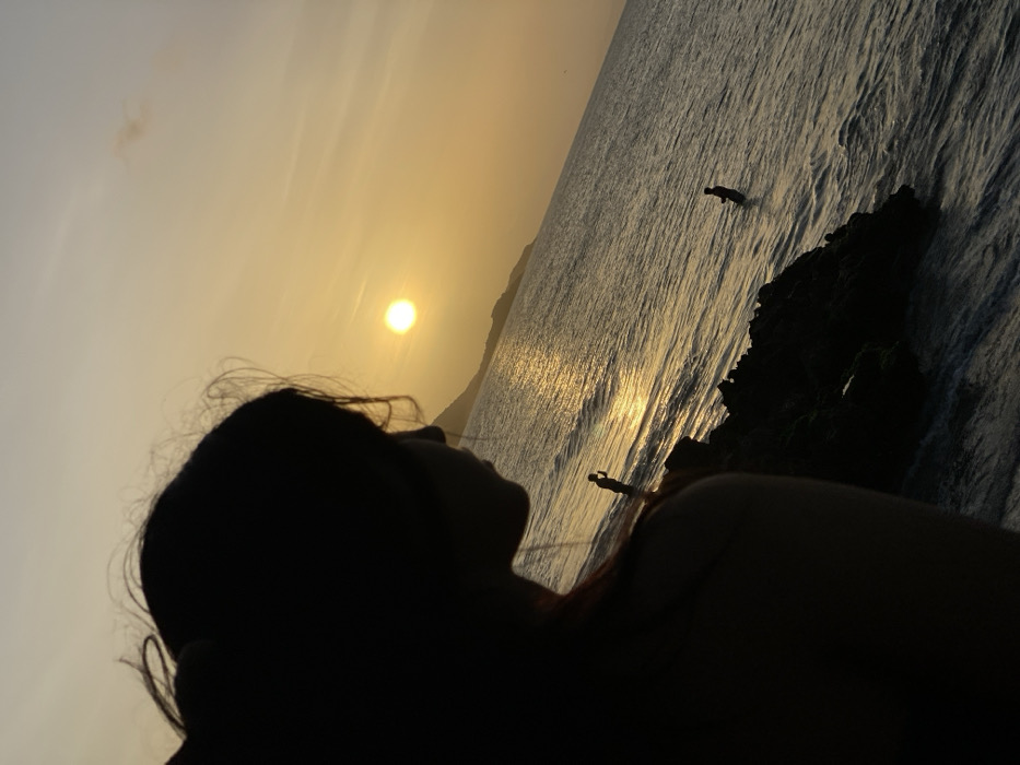 Sunset silhouette photography session at Juan Griego coastal rocks