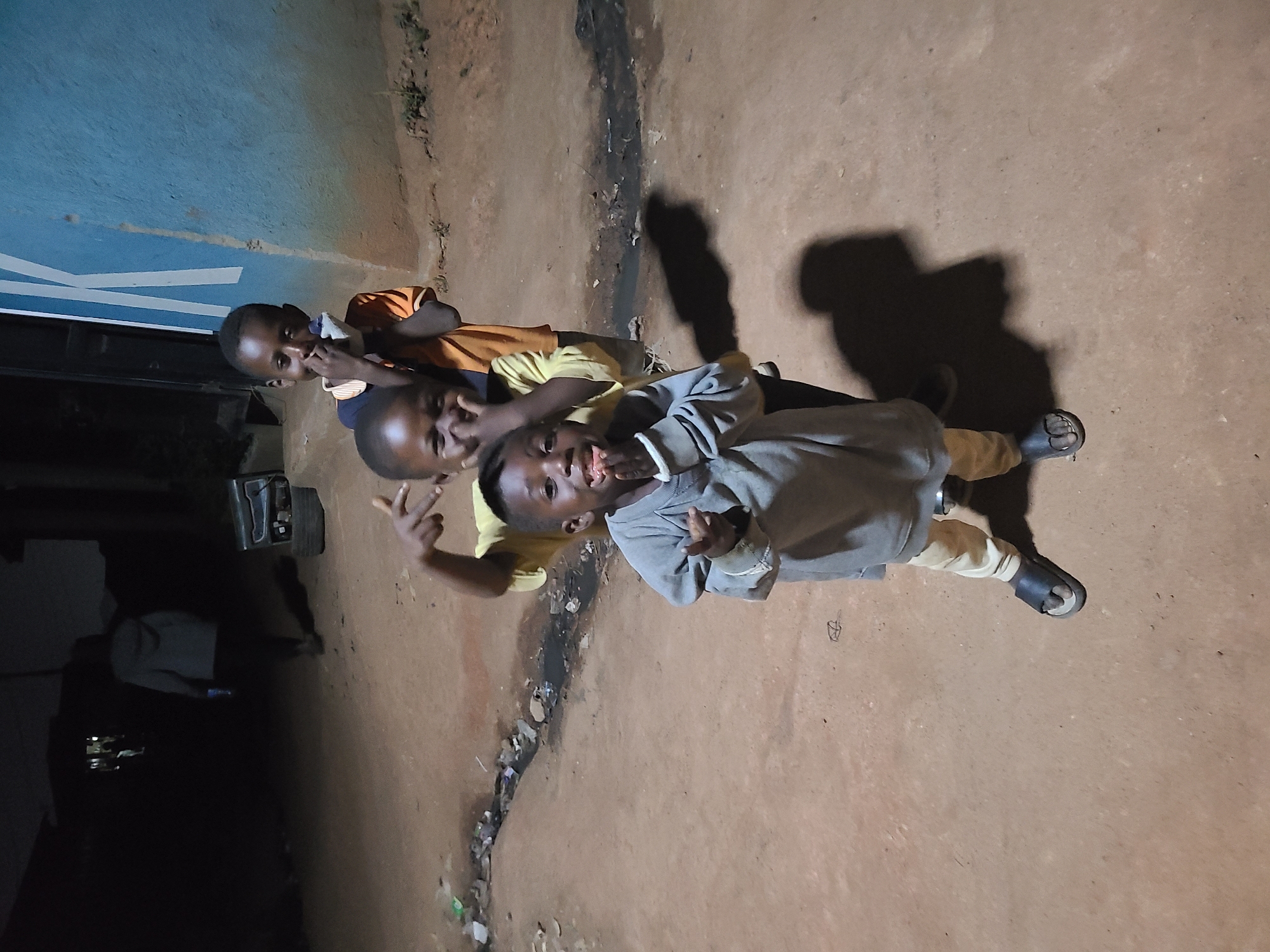 Children pose for photos in Jos, Nigeria streets