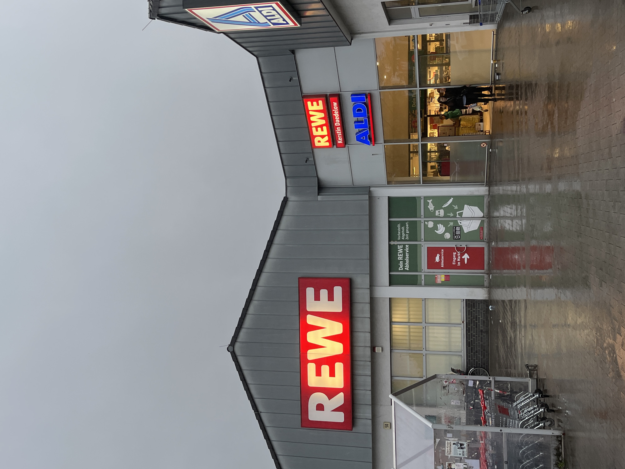 Berlin resident documents ordinary street life during rainy evening