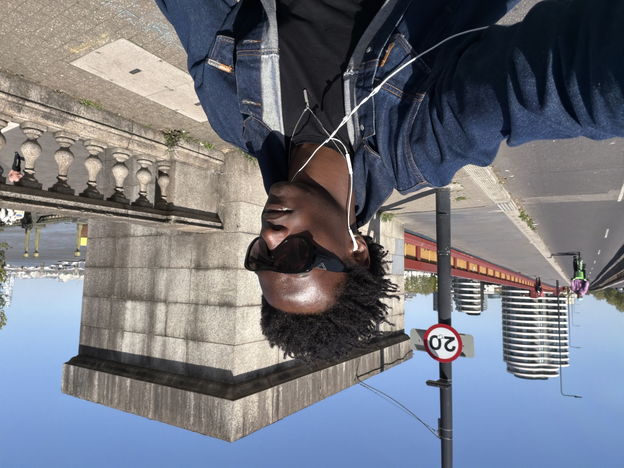 Tourist takes selfie on Tower Bridge, uses bike share