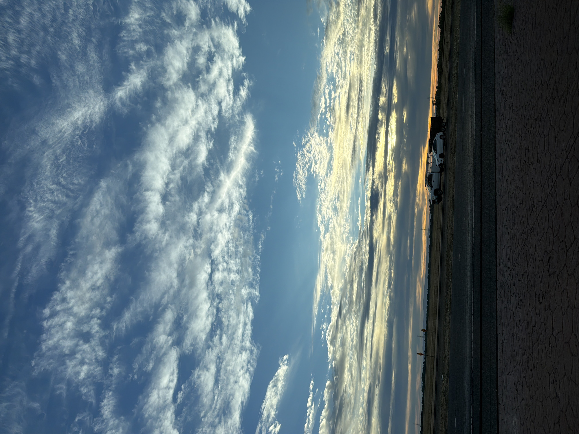 Costco truck on Elk Grove highway under a moody sunset sky