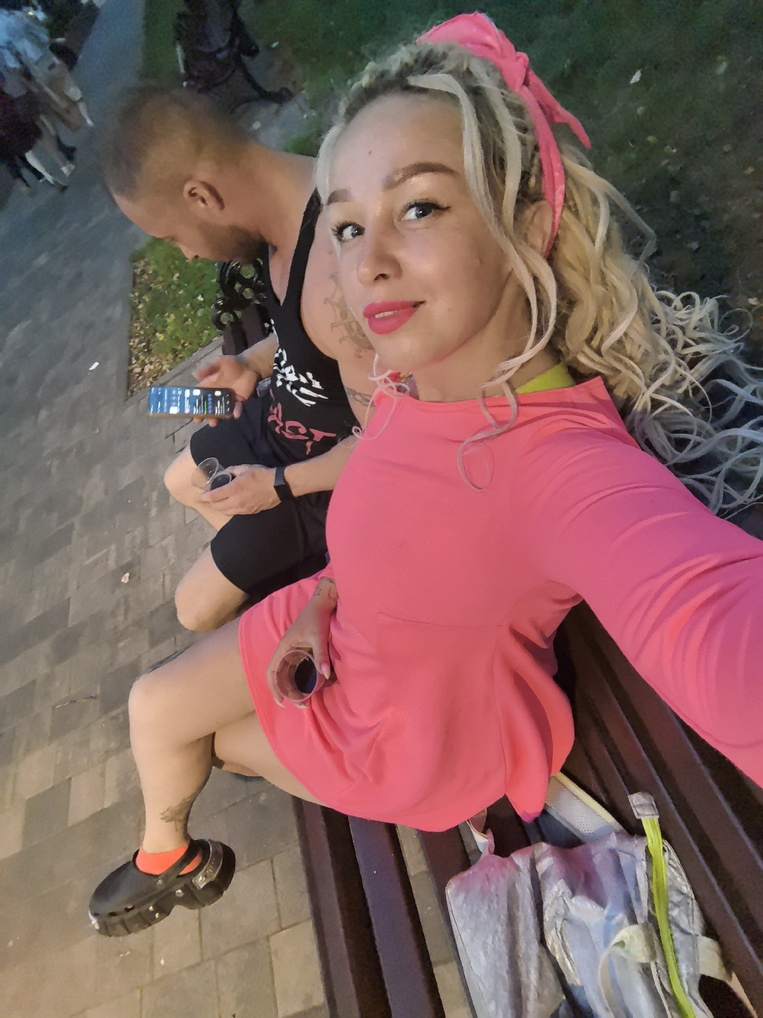Park bench hangout in Nizhny Novgorod, bold pink and Balenciaga