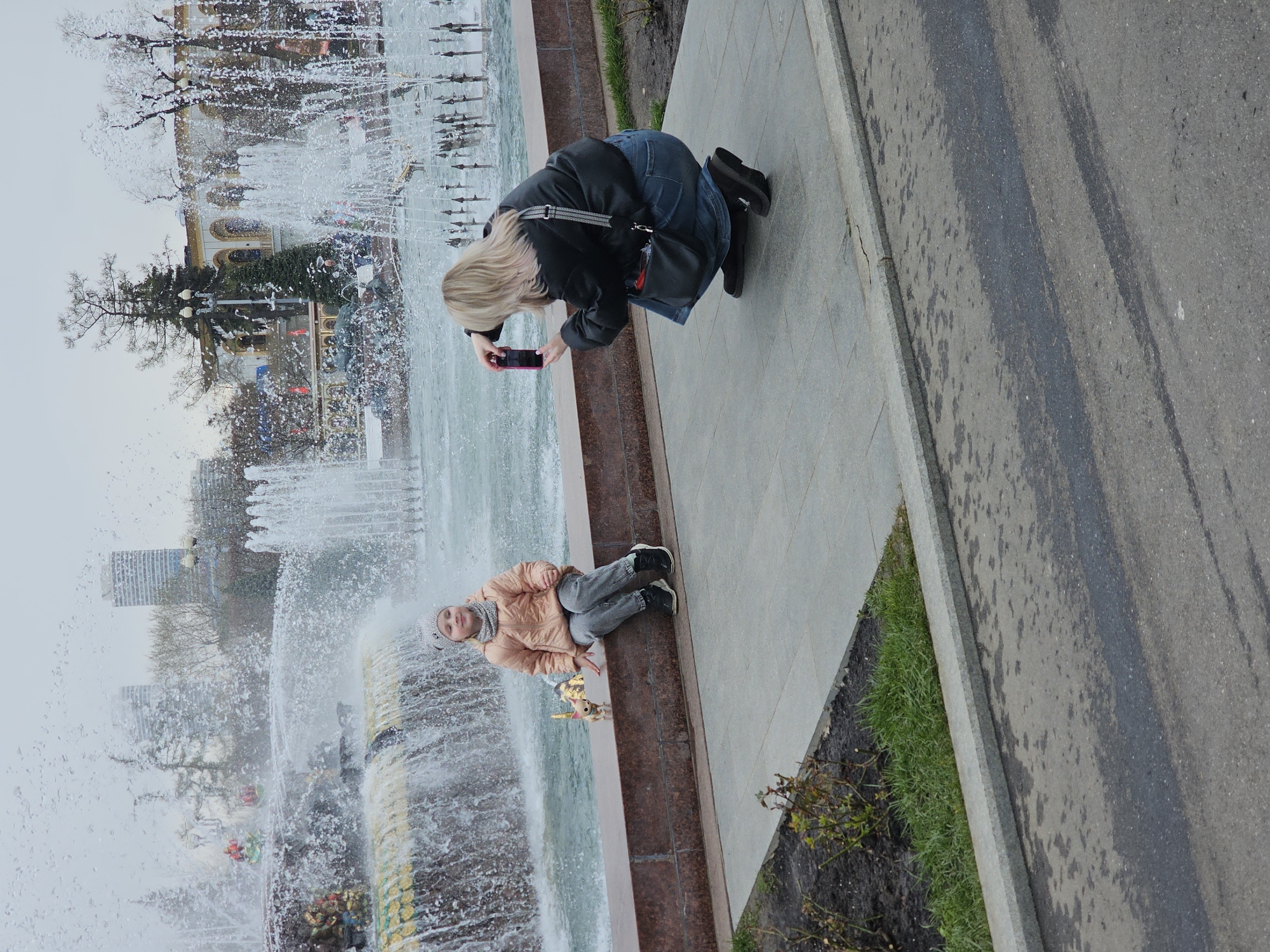 Morning visitors enjoy VDNKh park attractions in Moscow