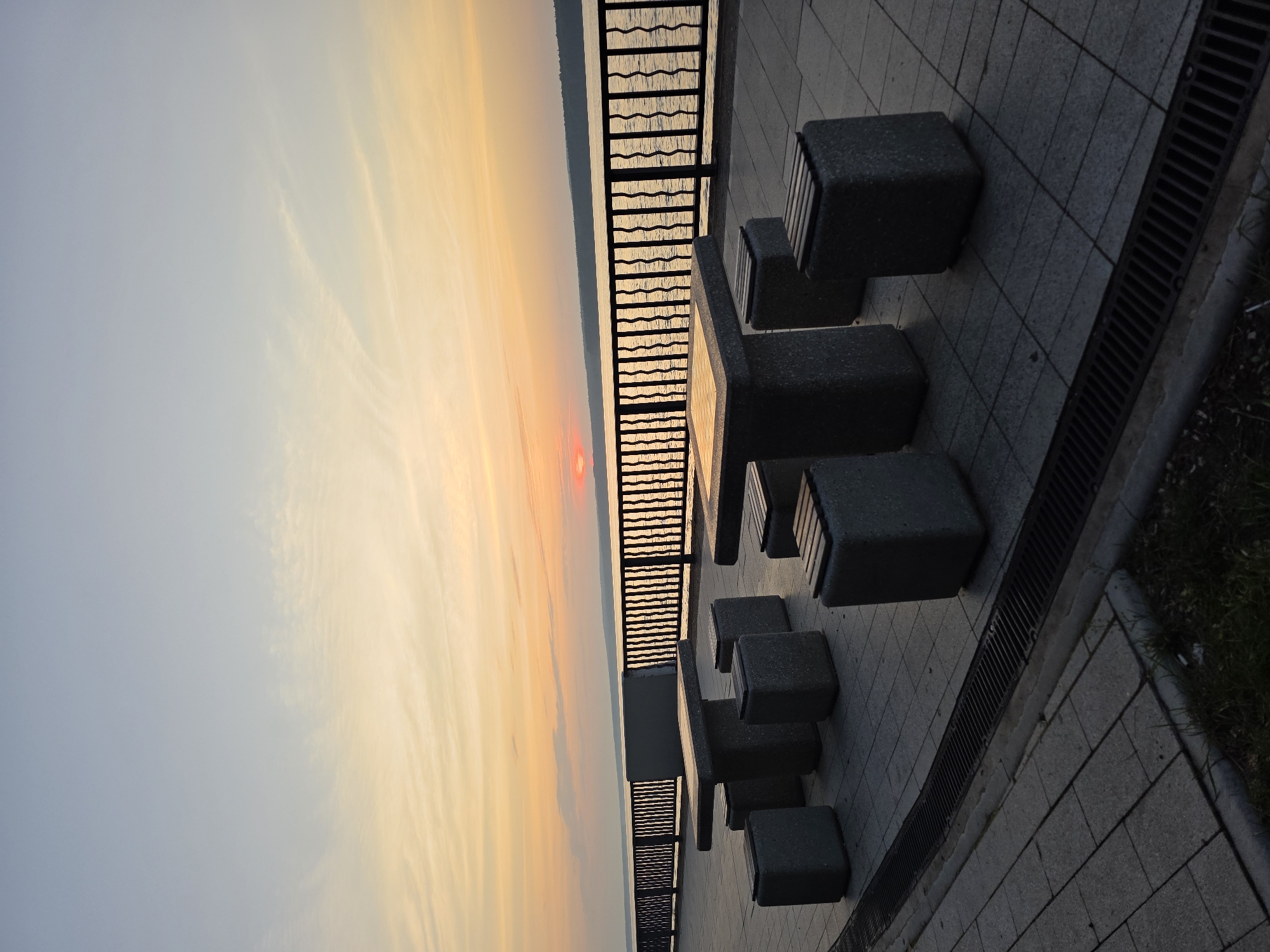 Sunset evening at a Kama River chess promenade in Chaikovsky