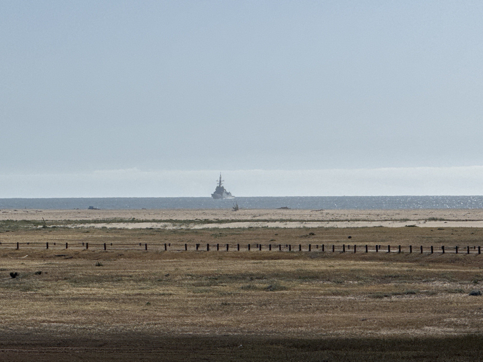 Tourist documents sunny coastal scenes in Figueira da Foz