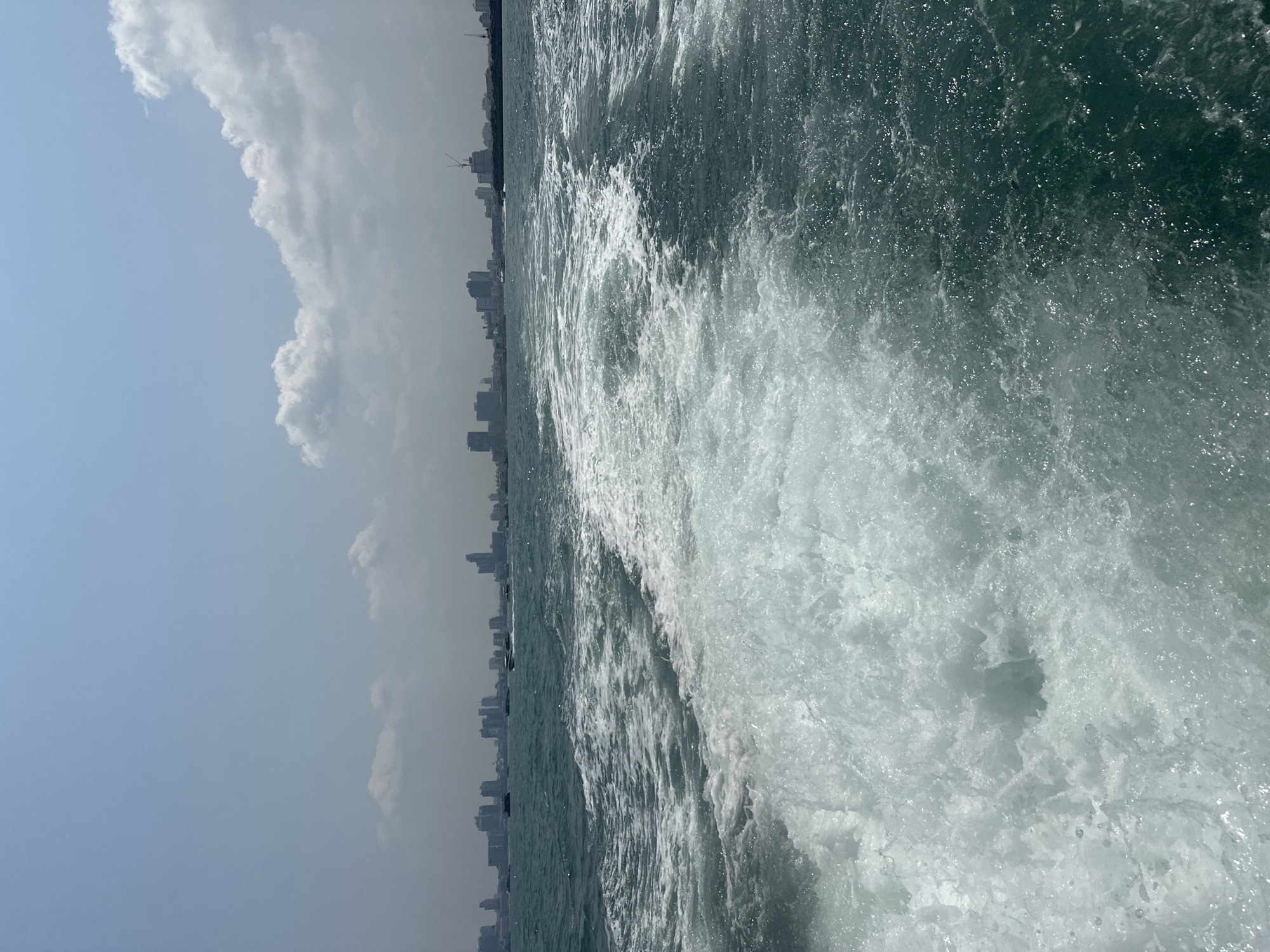 Boat creates wake in choppy Pattaya waters