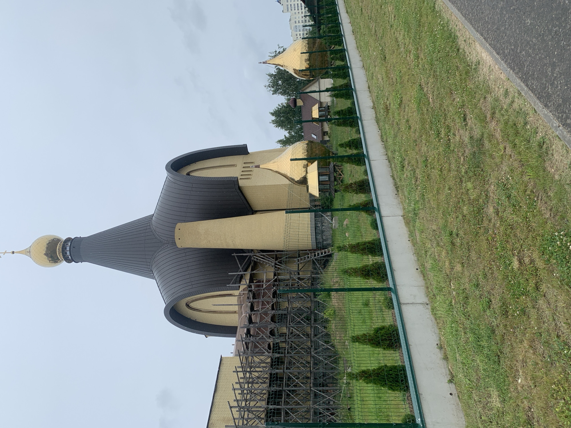Morning walk through Hrodna captures church construction, parks, city life