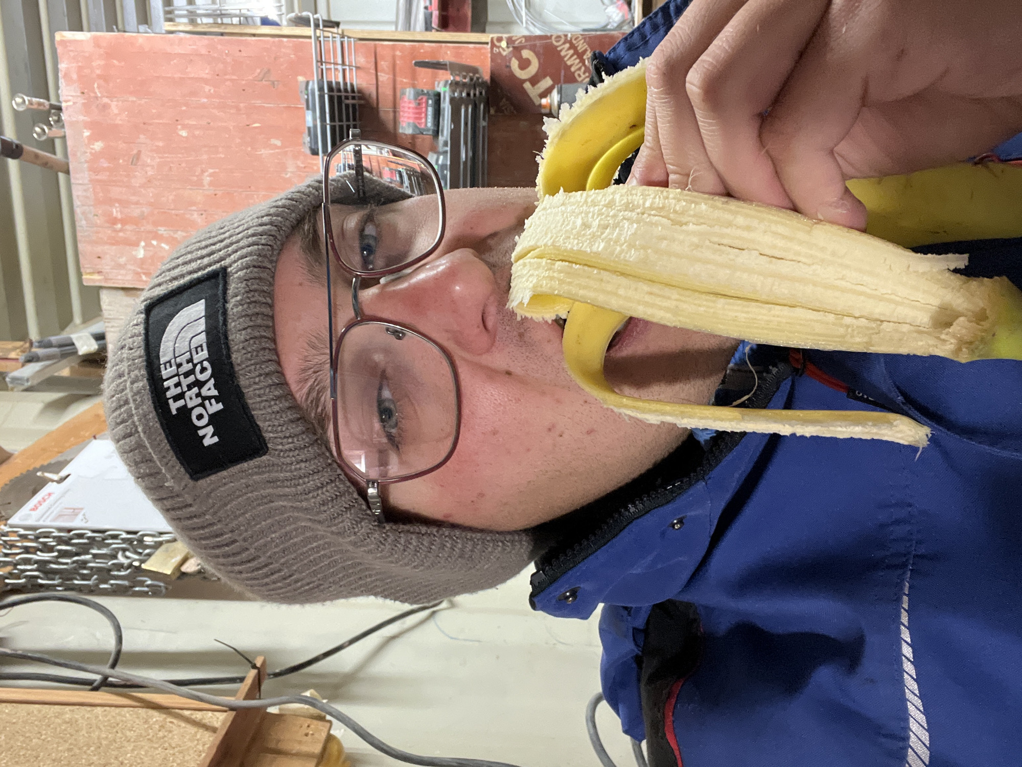 Worker takes snack break near construction site in Varna