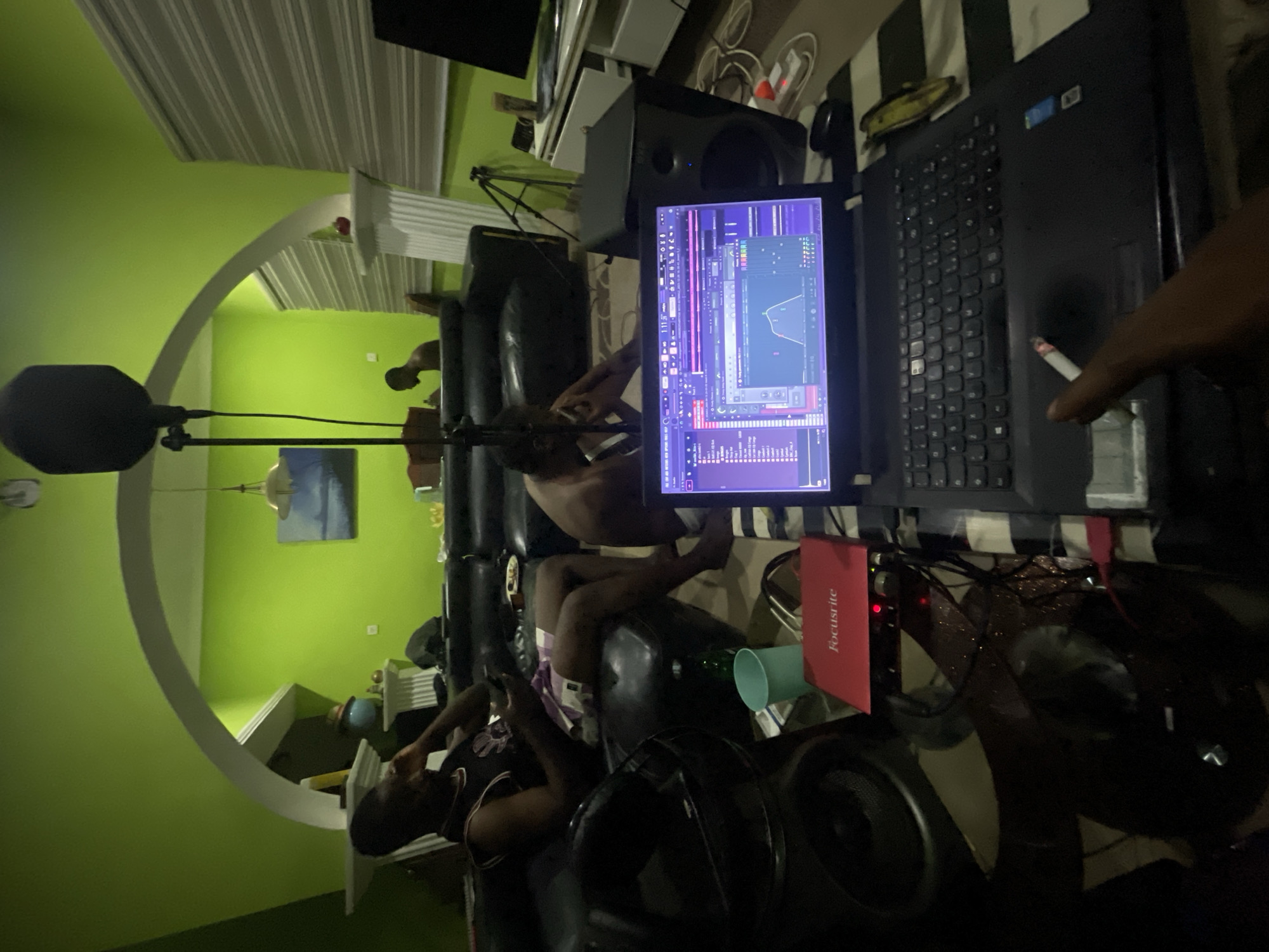 Music production session captured in Abuja home studio