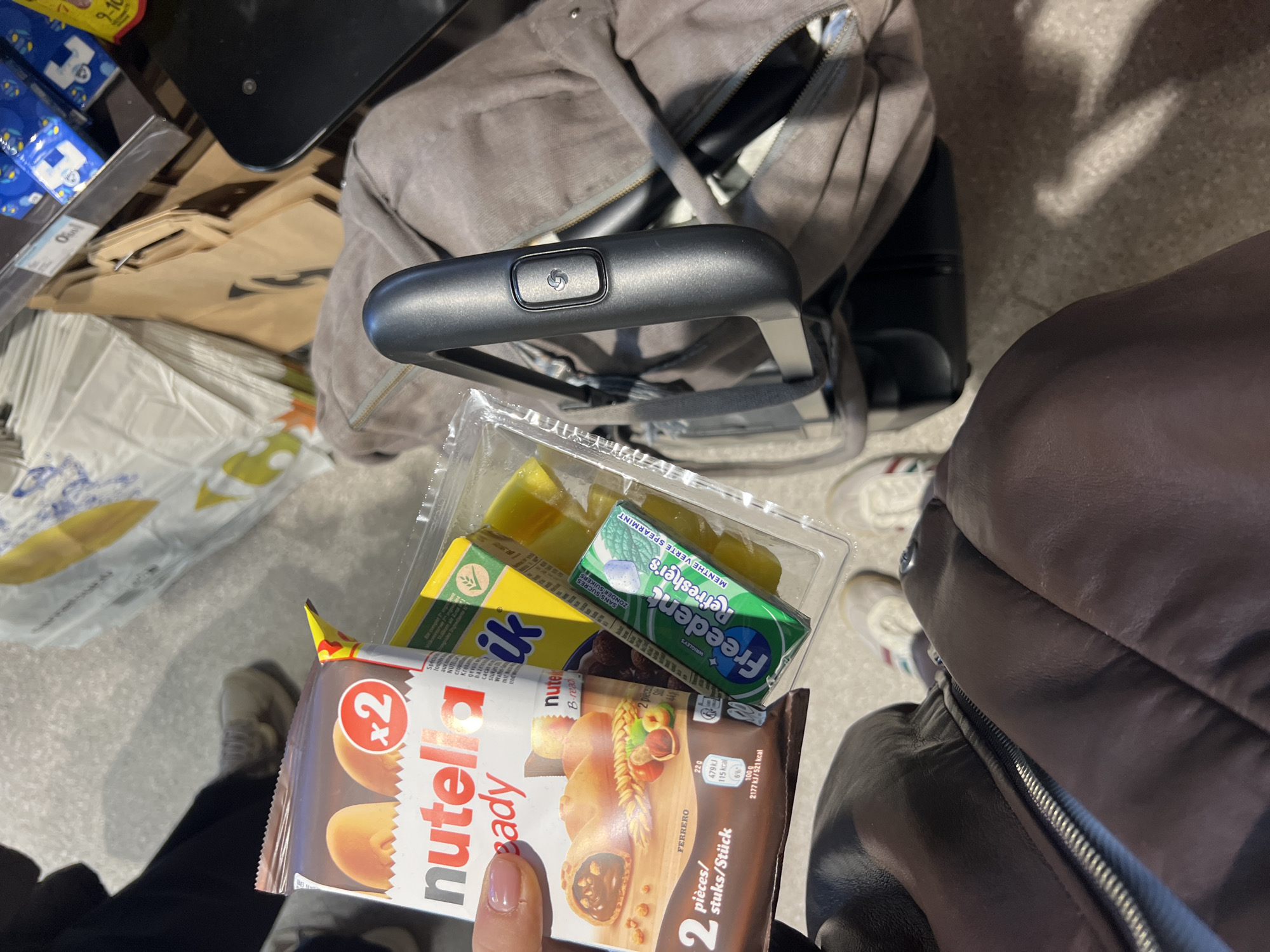 Traveler packing items with suitcase in Paray-Vieille-Poste