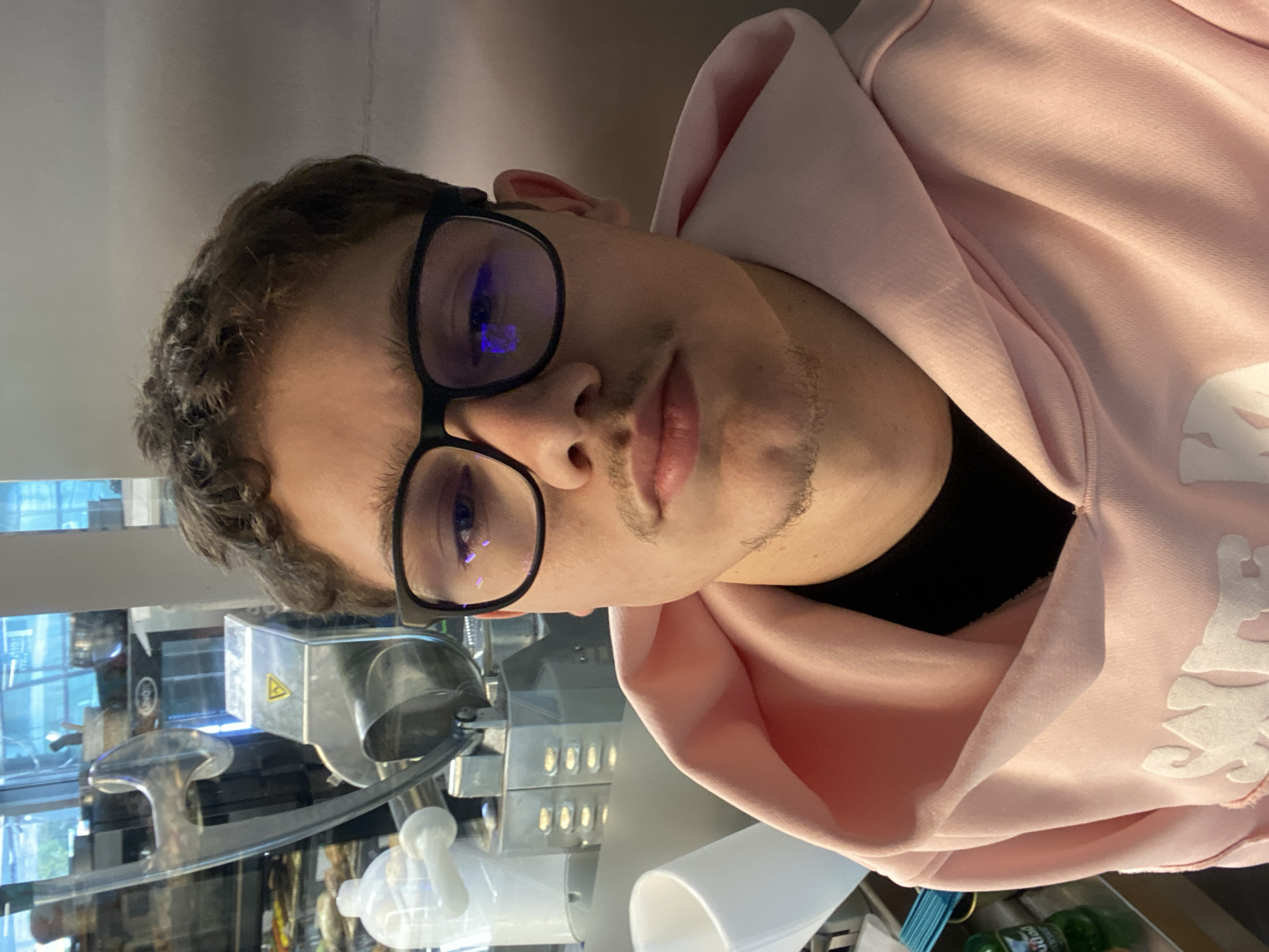 Young man photographed in Sofia wearing reflective glasses