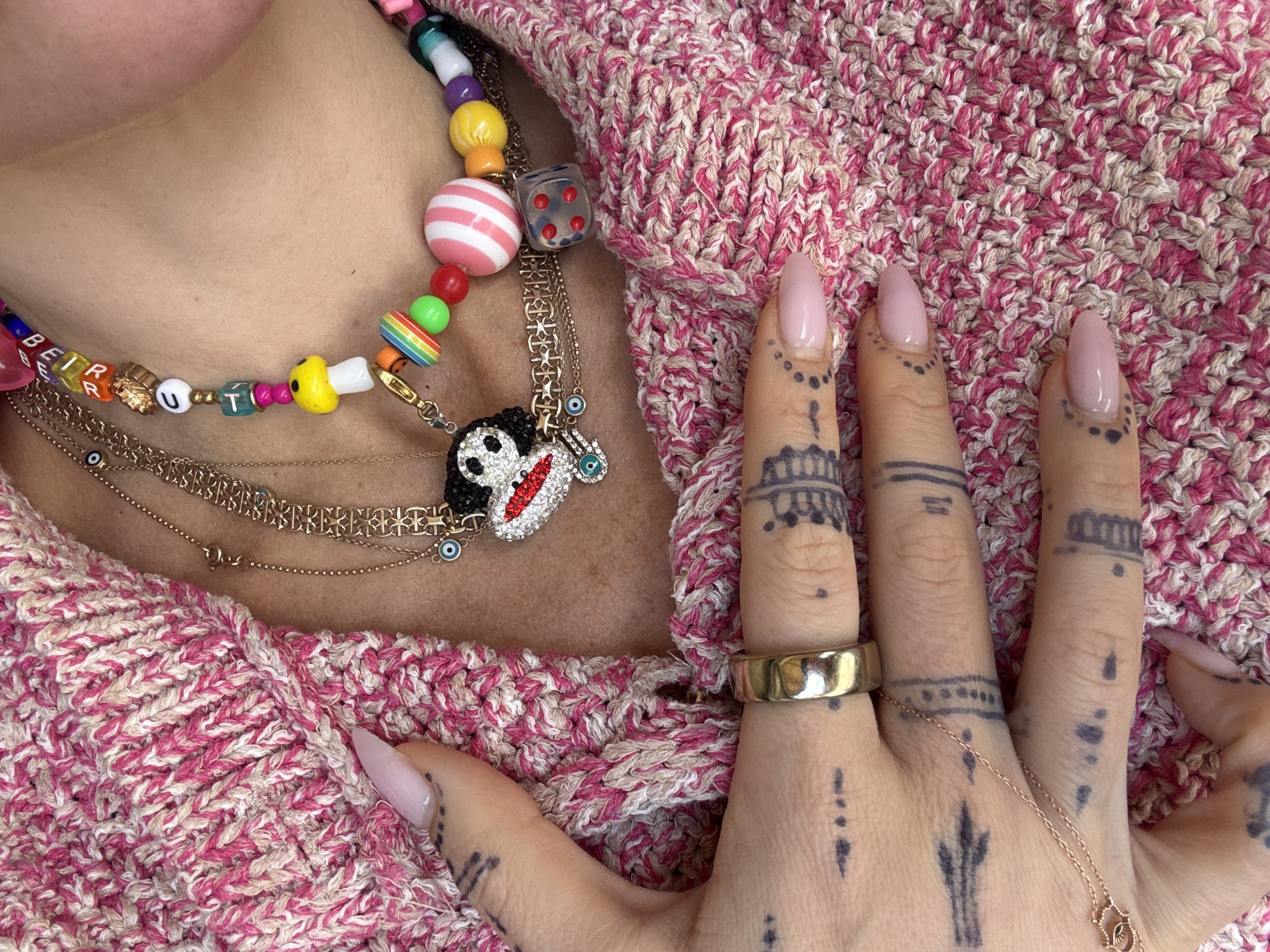 Person in layered jewelry spotted in Strömstad, Sweden