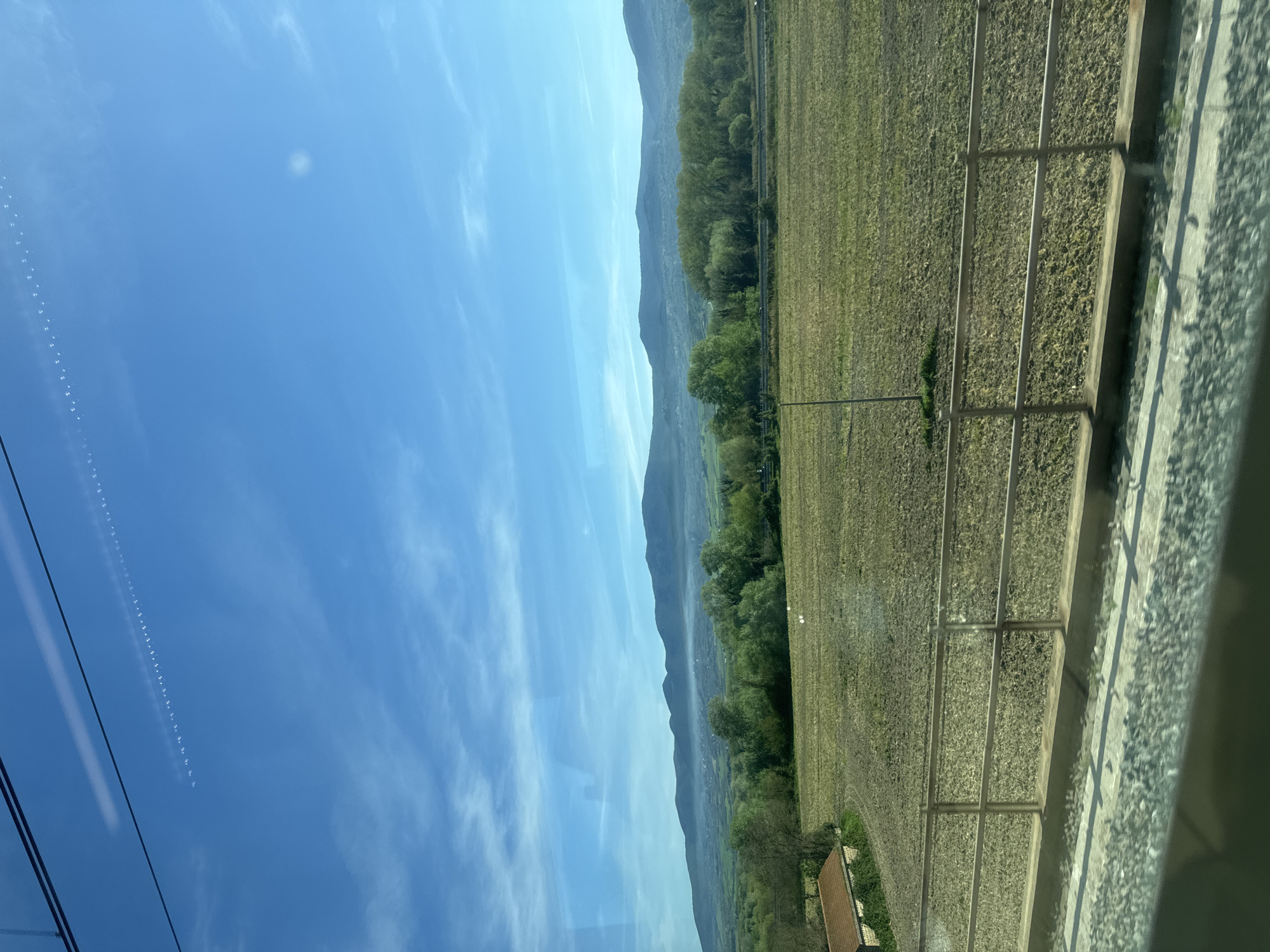 Train passenger captures morning sky view in Alviano Scalo