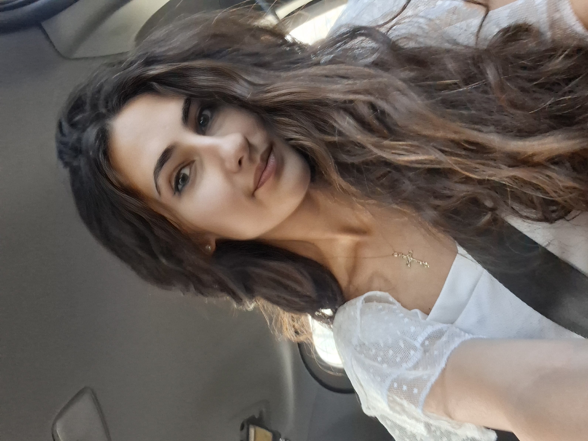 Post-shopping selfies snapped inside a car with haul in tow
