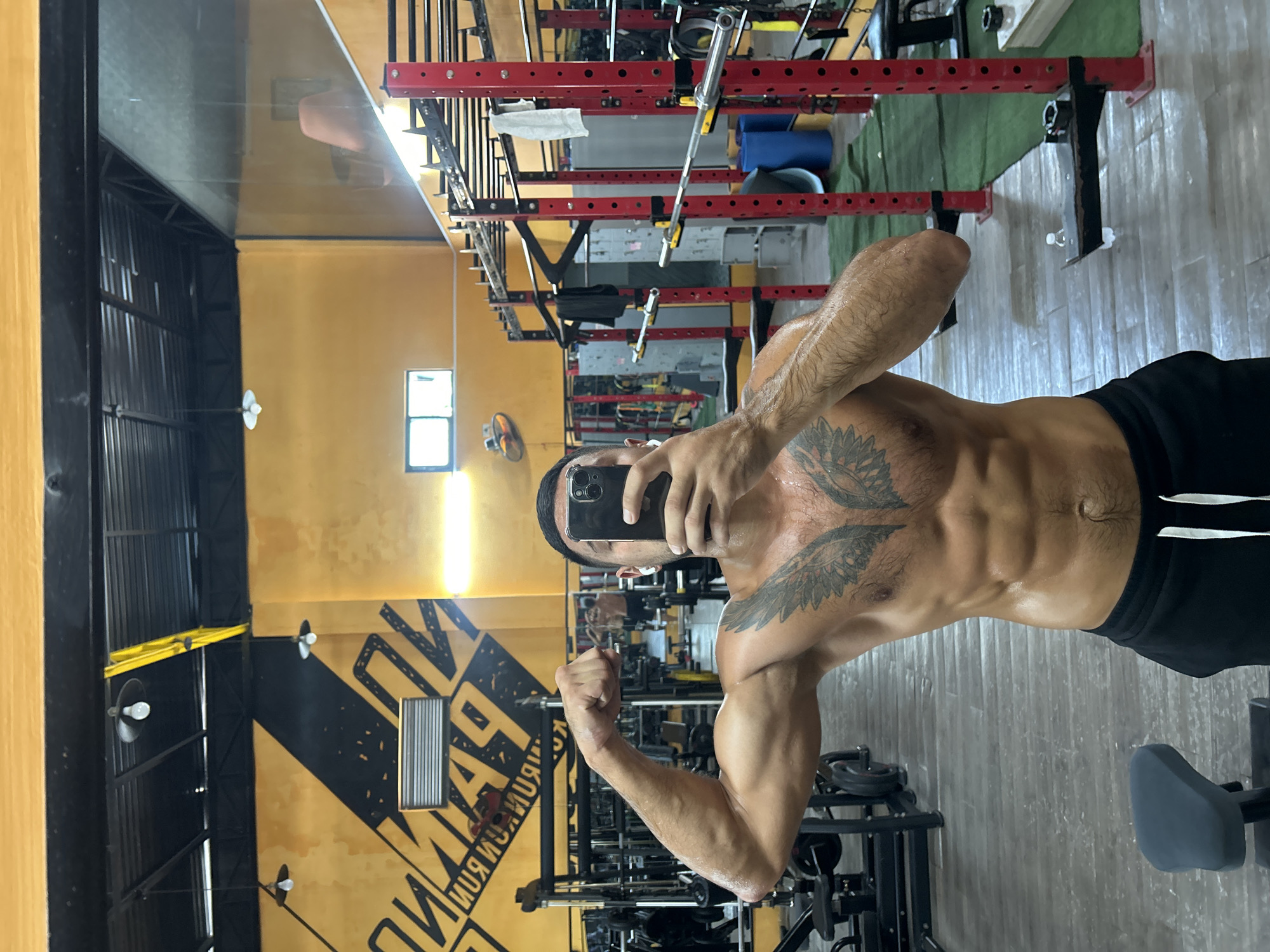 Gym mirror selfie flex in Nha Trang
