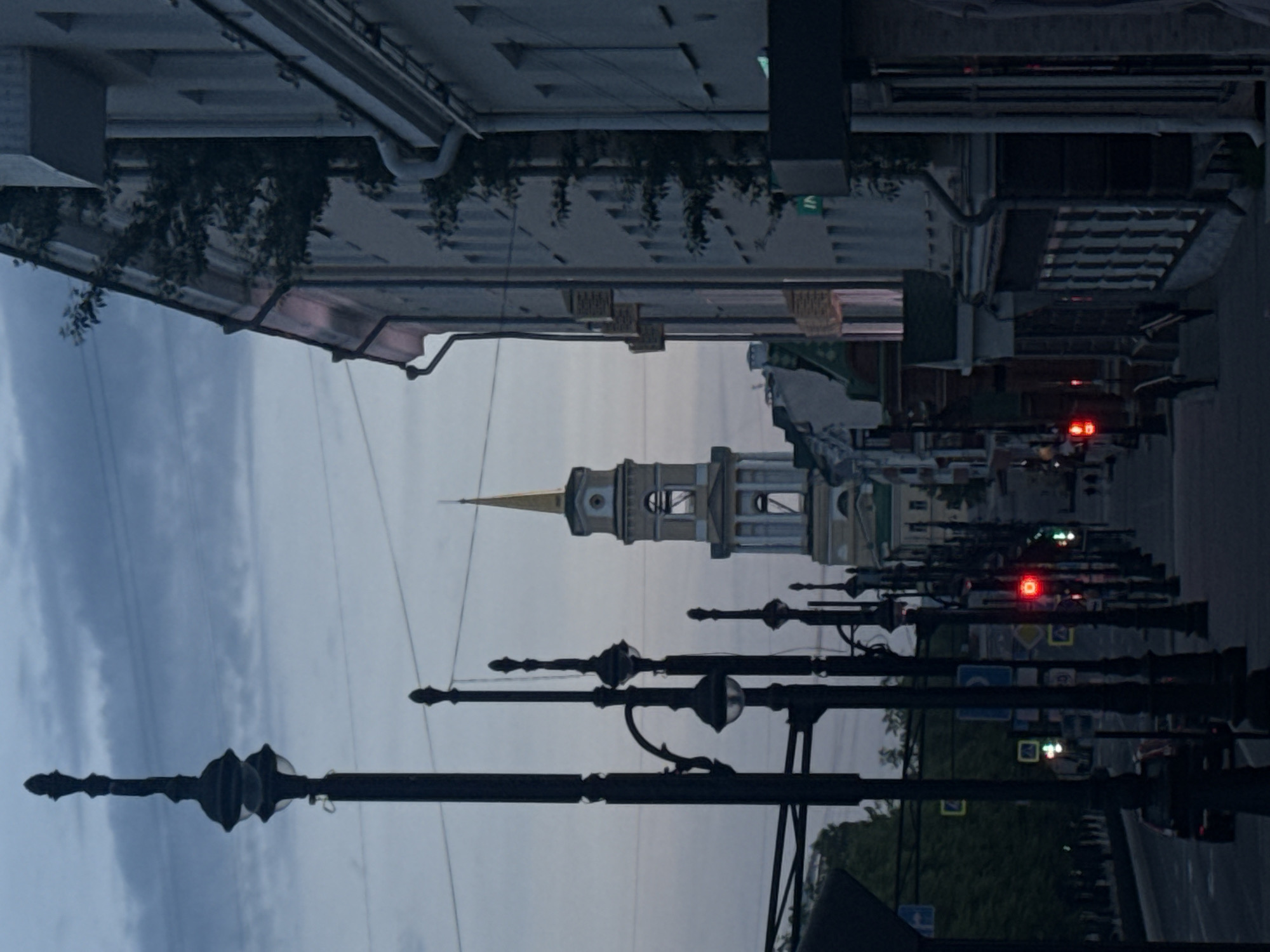 Tourist captures Perm landmarks and street life near cathedral