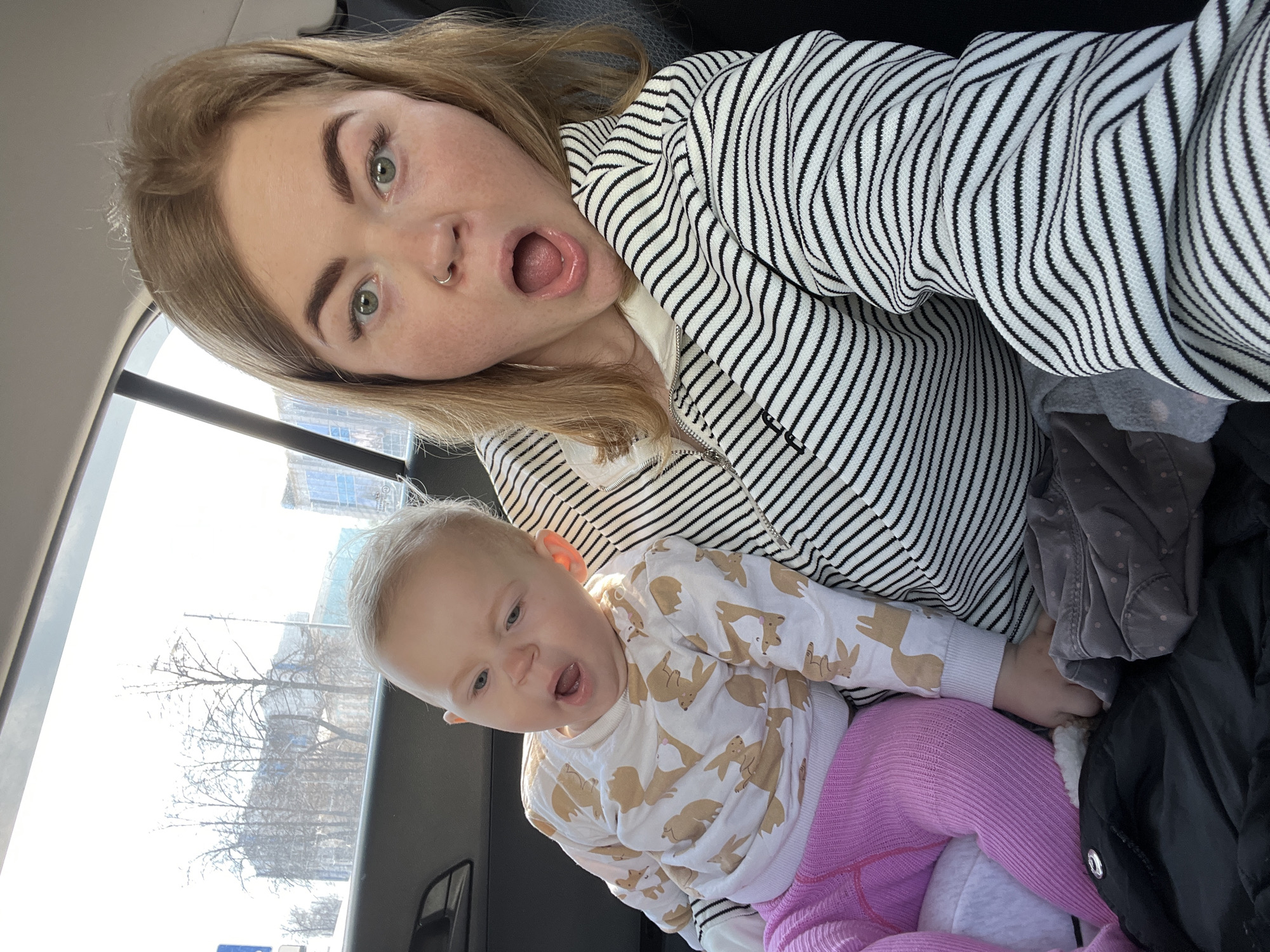 Woman with baby photographed in vehicle, Perm Russia