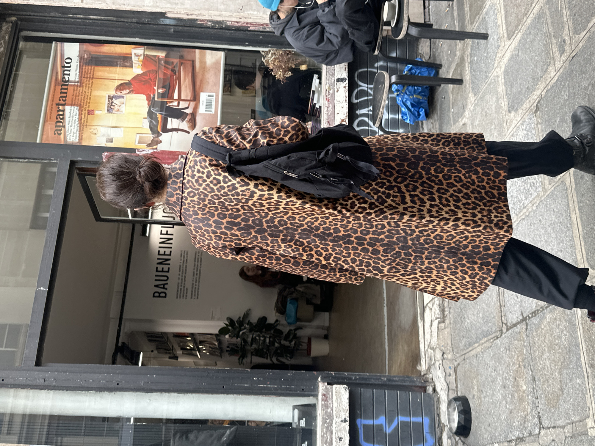 Parisians enjoy casual afternoon coffee and street life