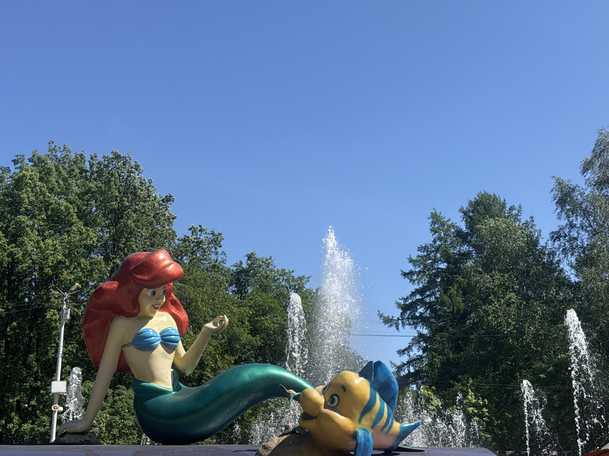 Morning walk through Yekaterinburg captures statues, dandelions, and parks