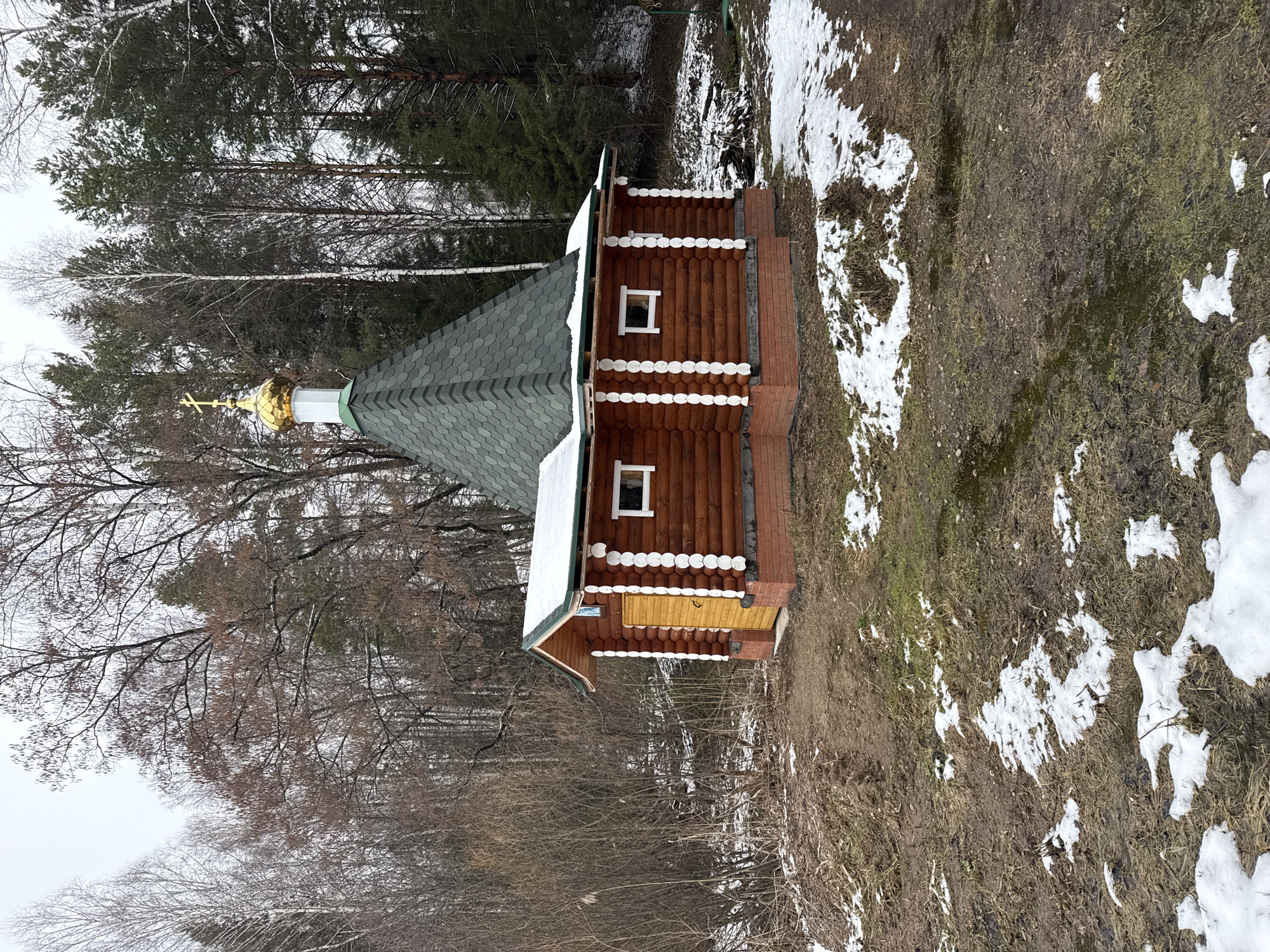 Wooden Orthodox church documented in snowy Karsha, Russia