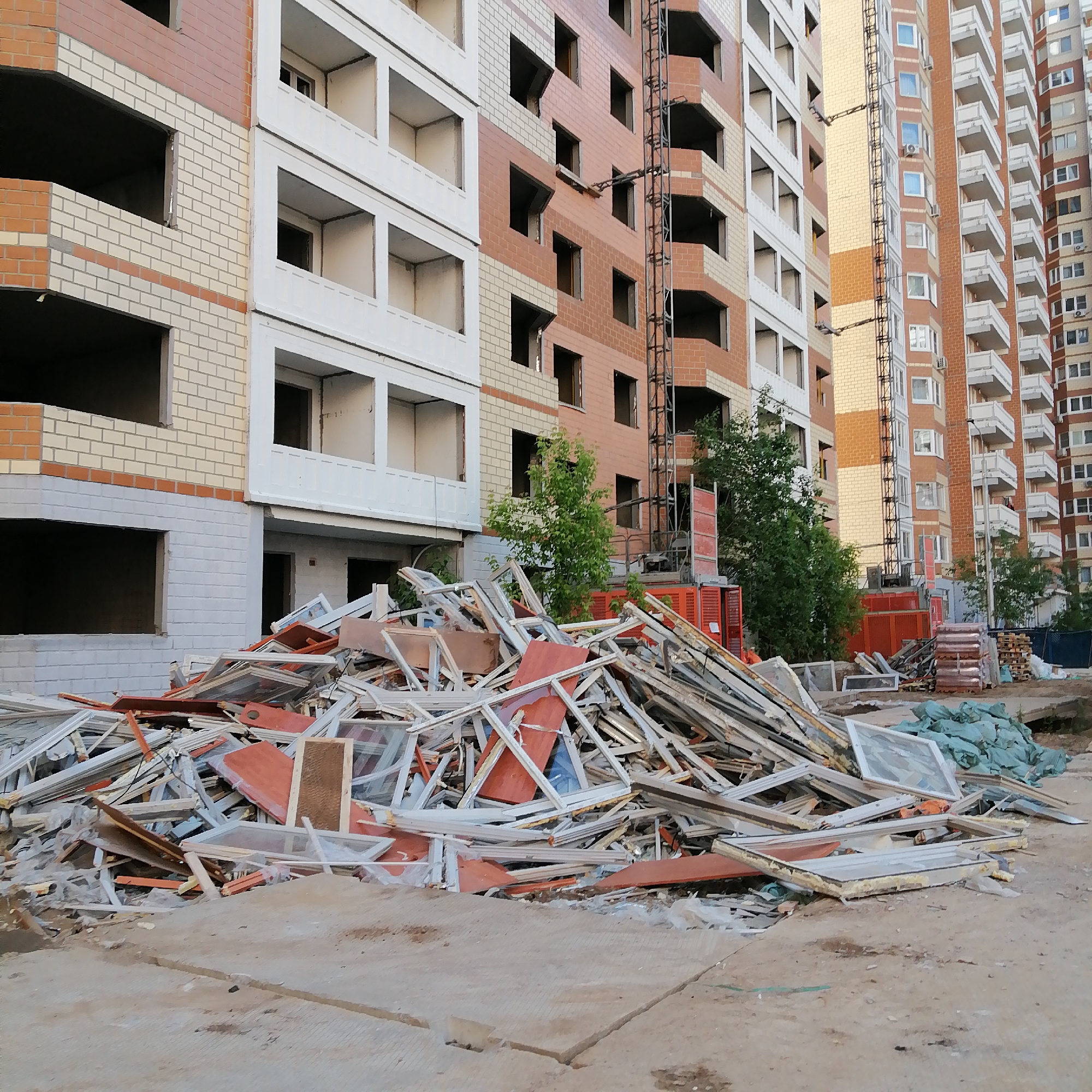 Early morning urban construction activities and cryptocurrency promotions documented