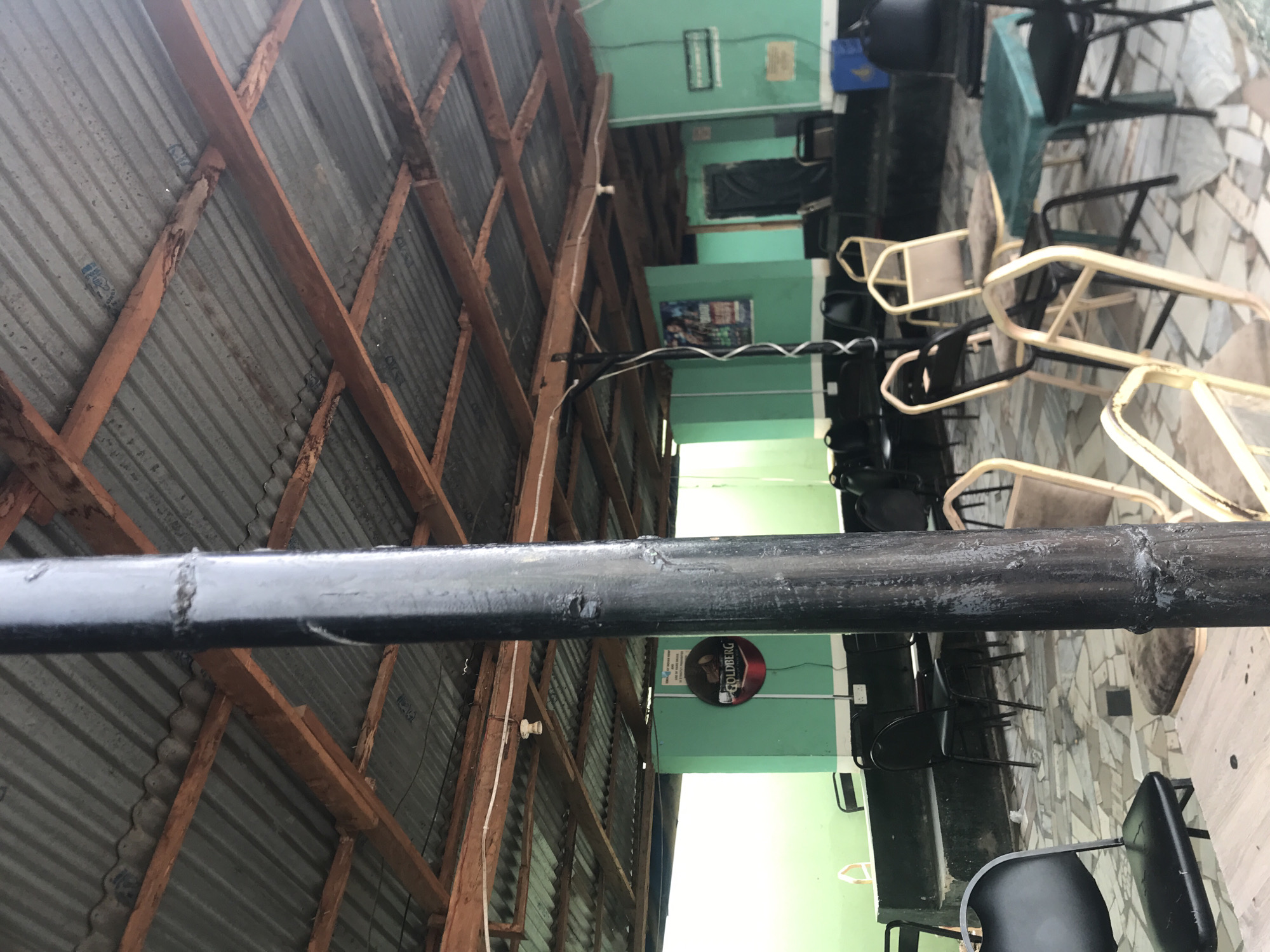 Afternoon social gathering at Nigerian pool hall documented