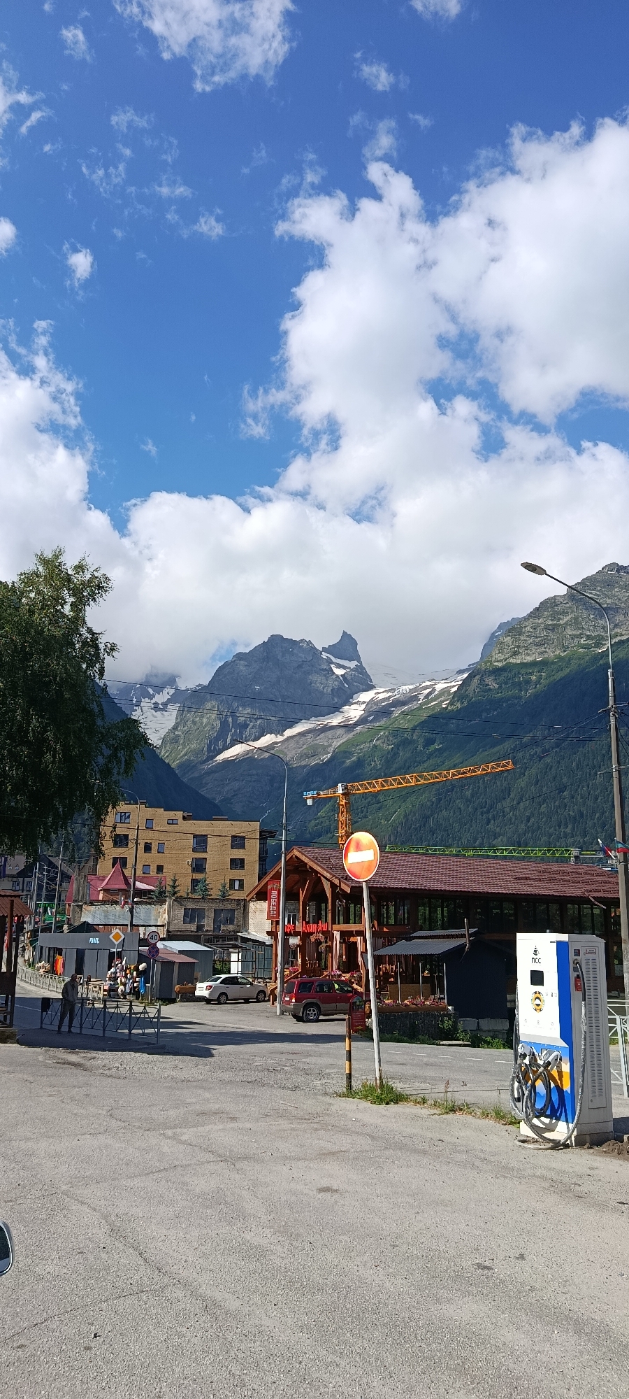Street-level views of Dombay's dramatic Caucasus mountain backdrop