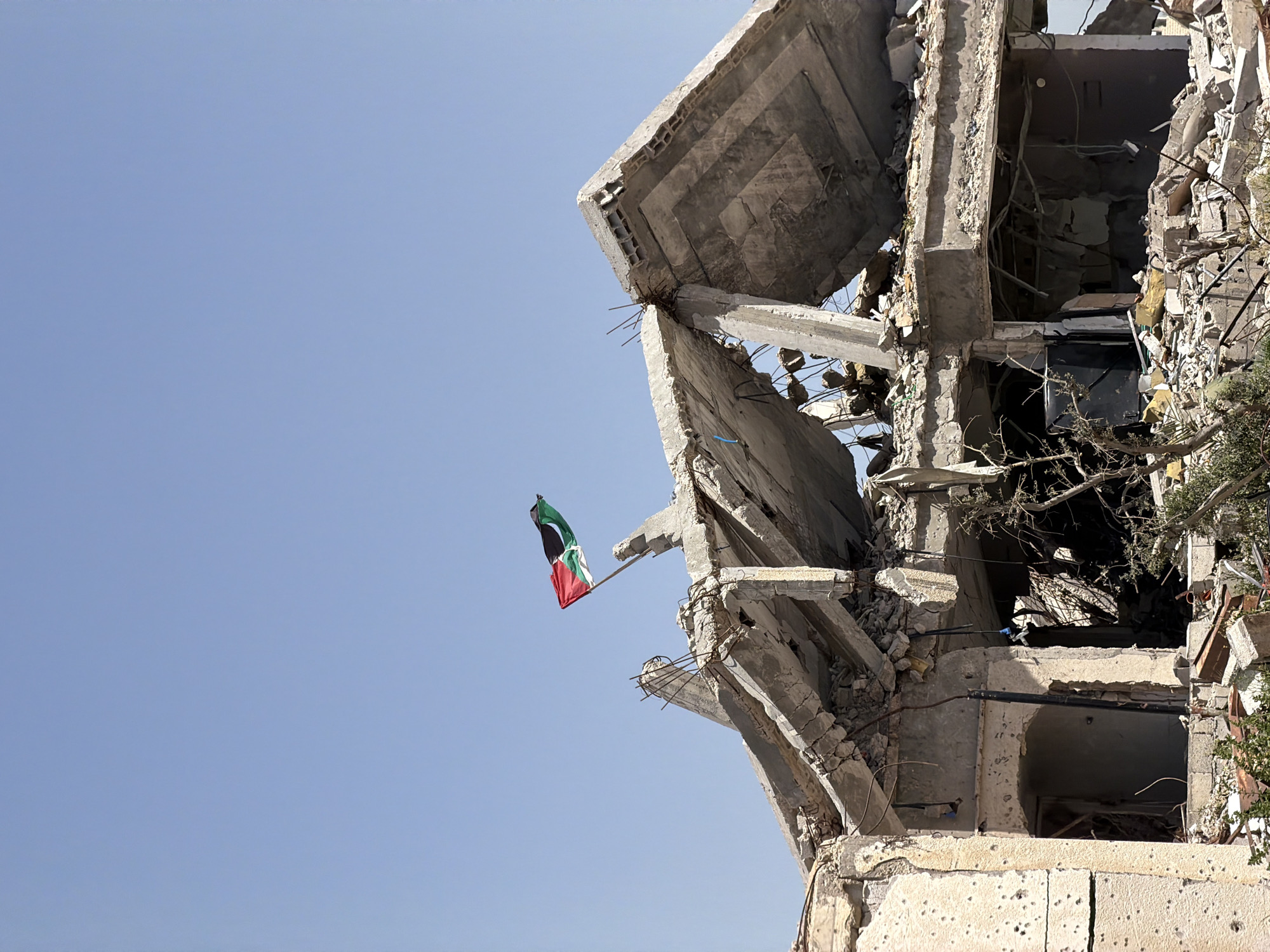 Destruction documented in al-Qarara with damaged buildings, infrastructure