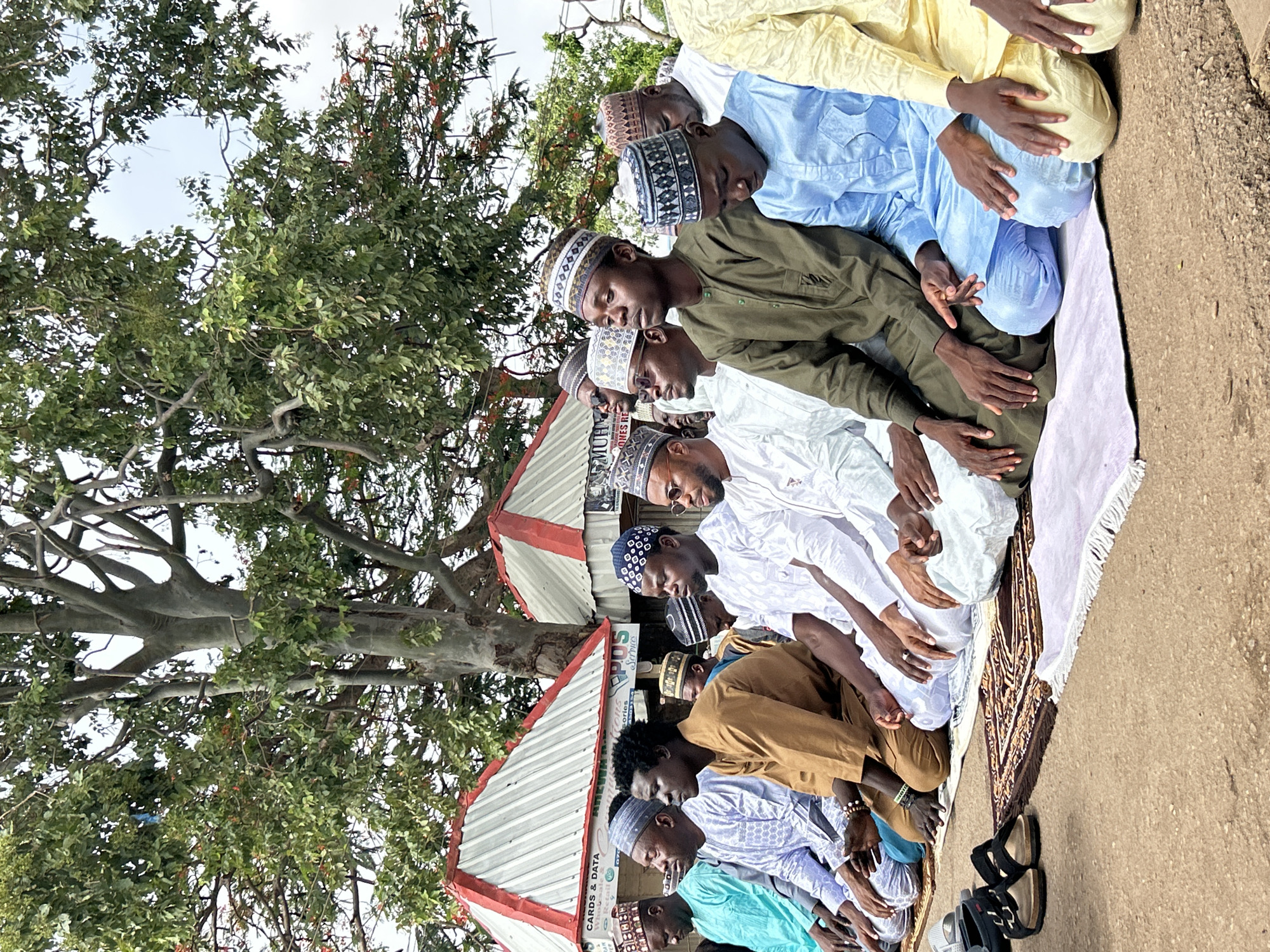 Men hold outdoor prayer session in Jos, Nigeria