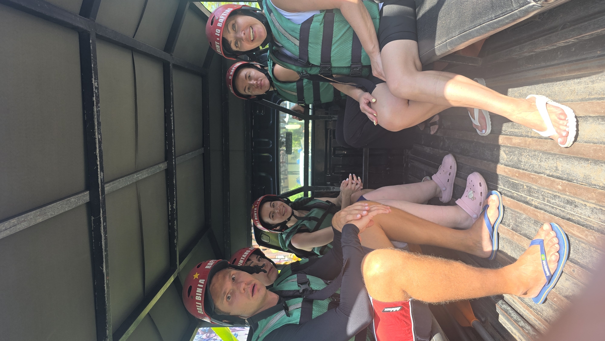 Group travels in open-air vehicle through Ubud District