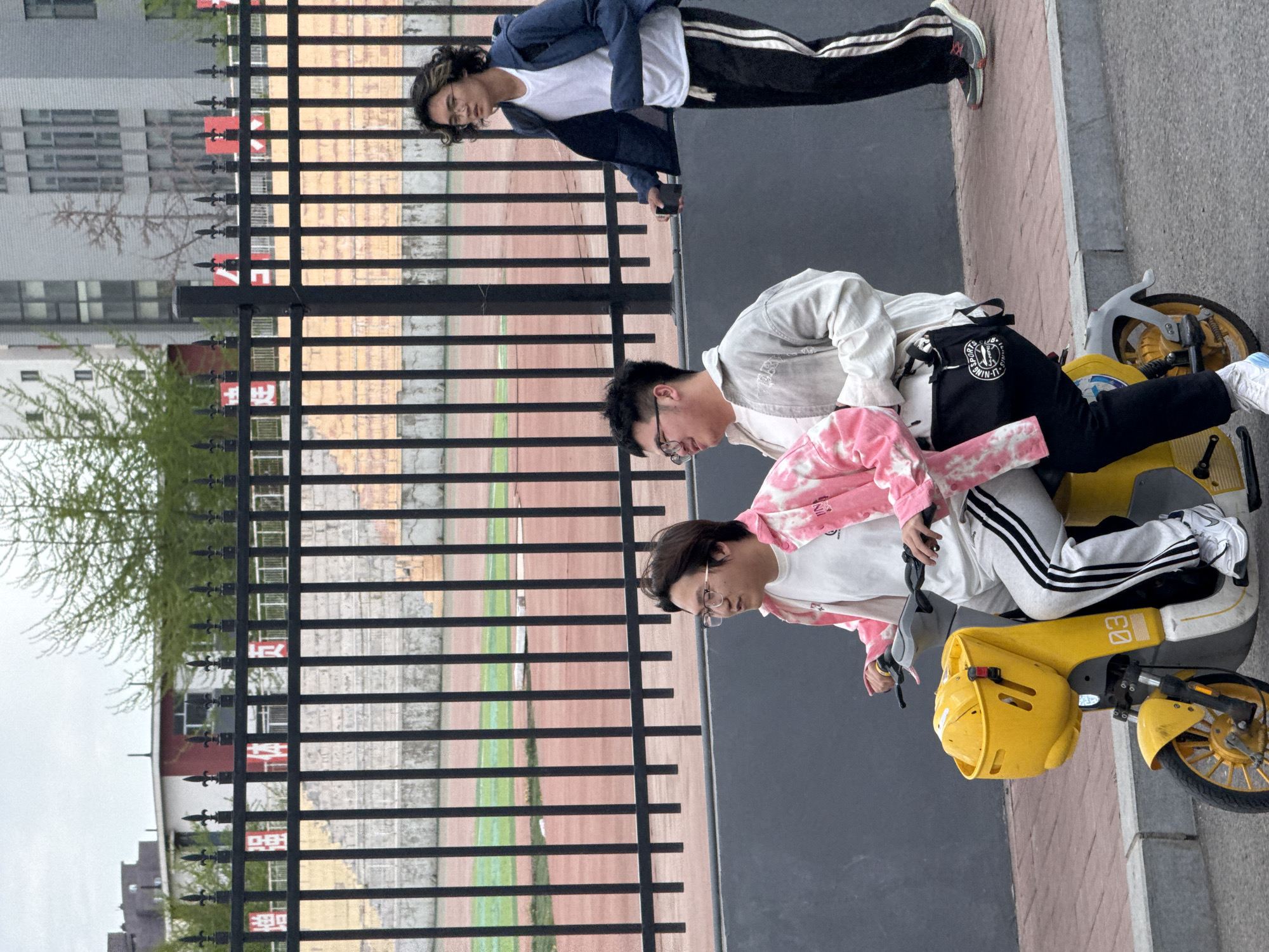 Young people gather in early morning Zhongtun urban setting