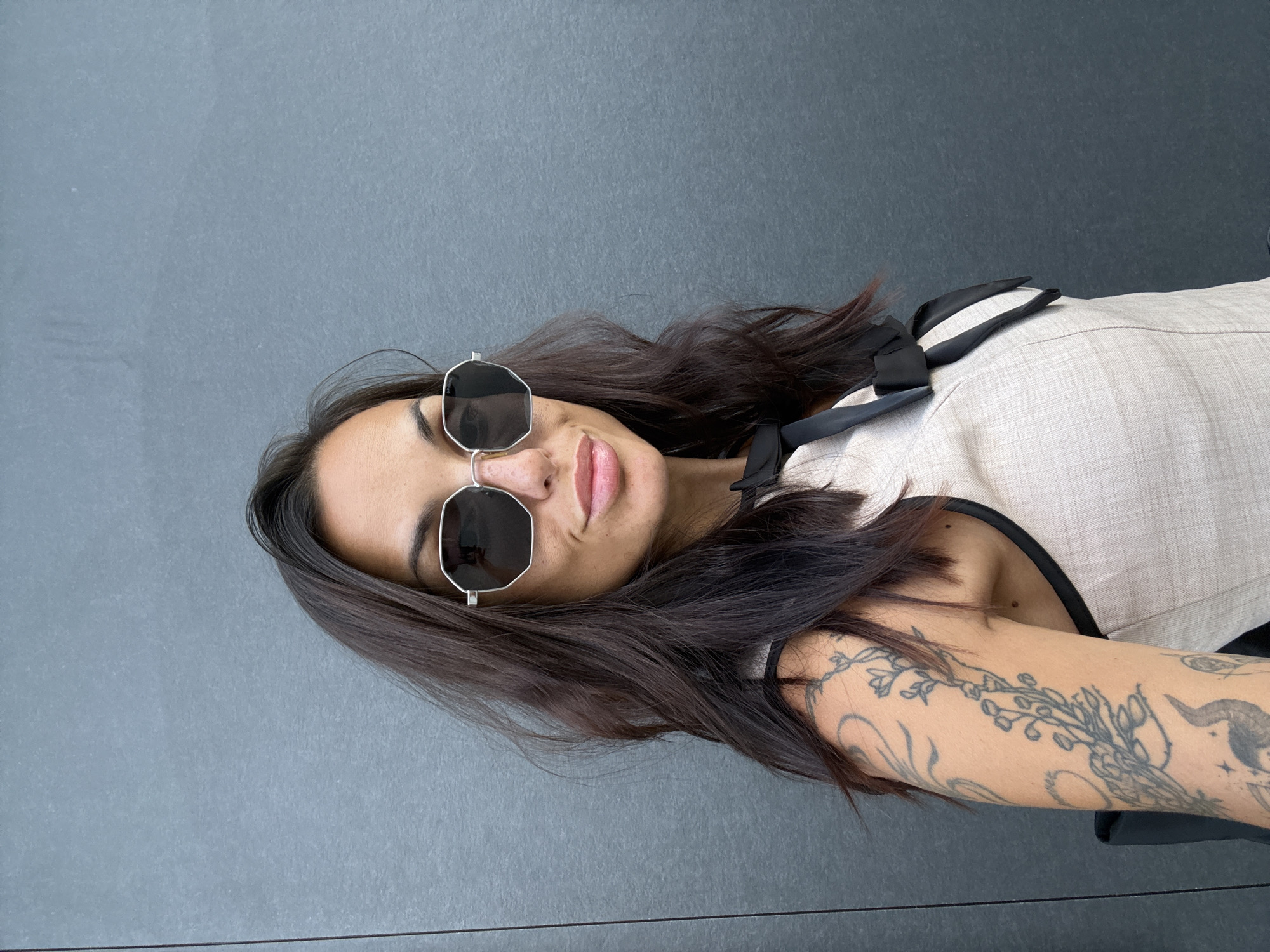 Casual portrait against a textured wall in Pleven, Bulgaria
