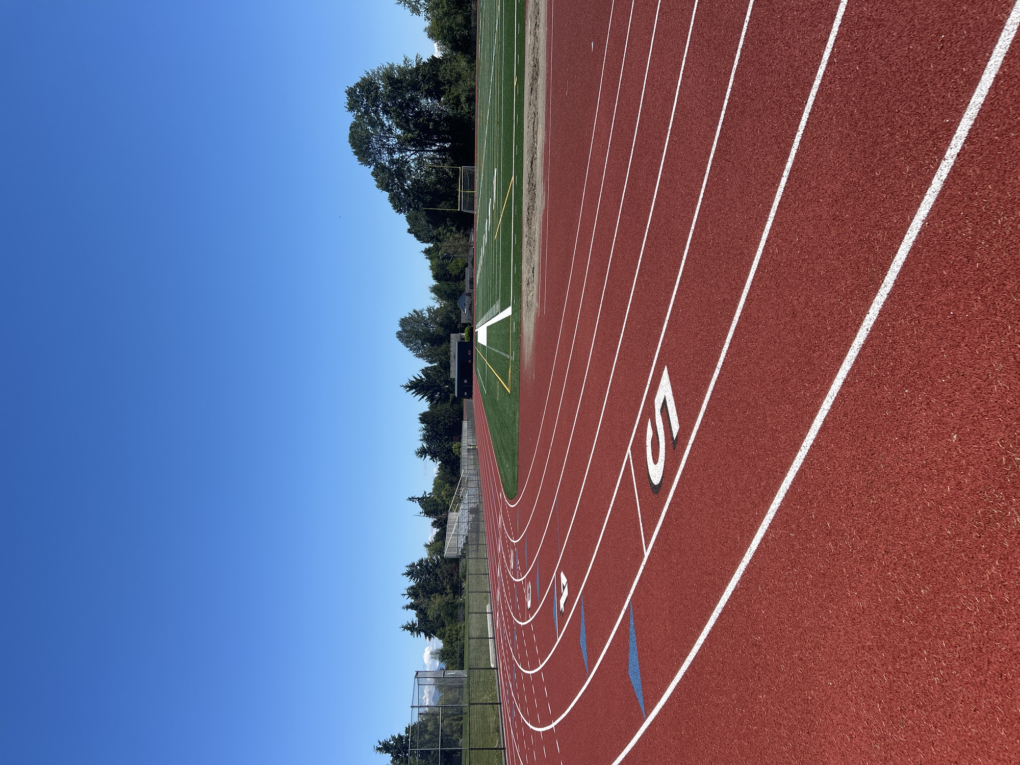 Athletic track facility observed in Everett under clear skies