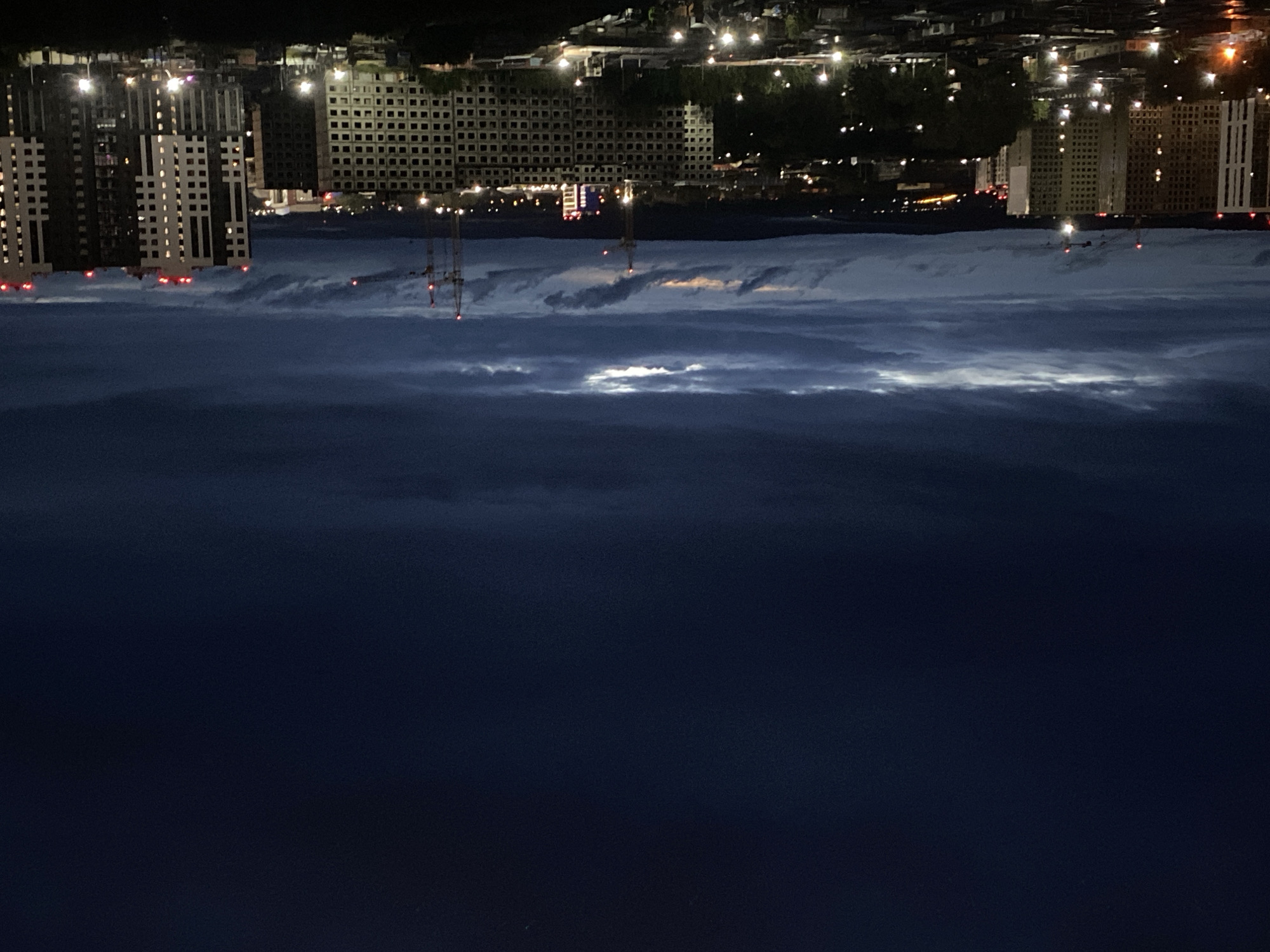 Irkutsk skyline at night under heavy cloud cover