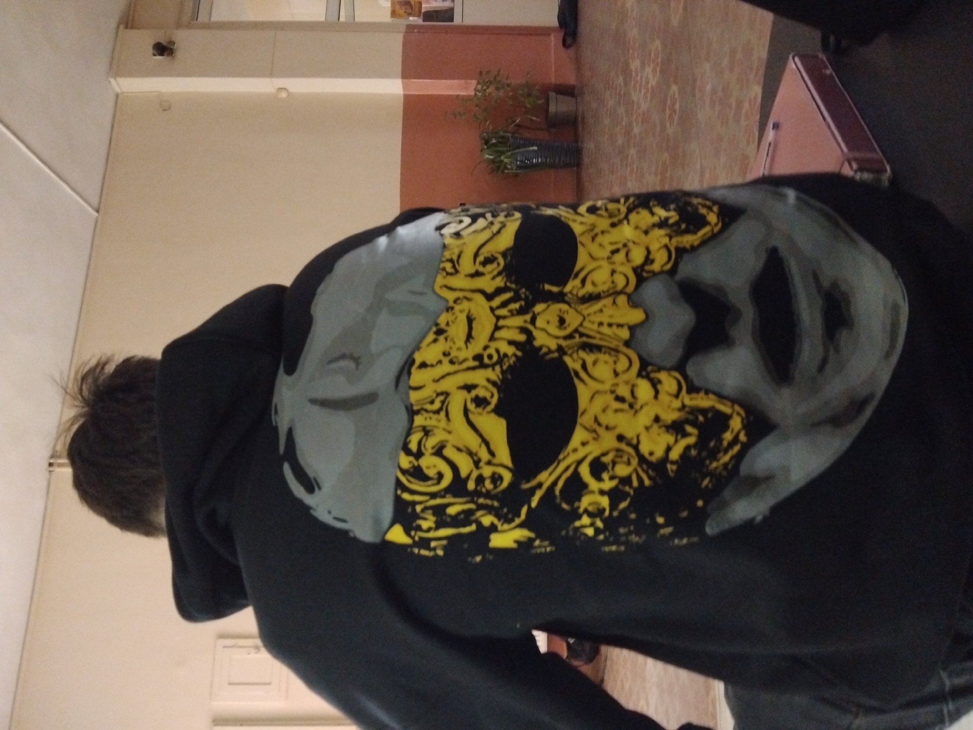 Person in decorated skull hoodie photographed in Nova Zagora