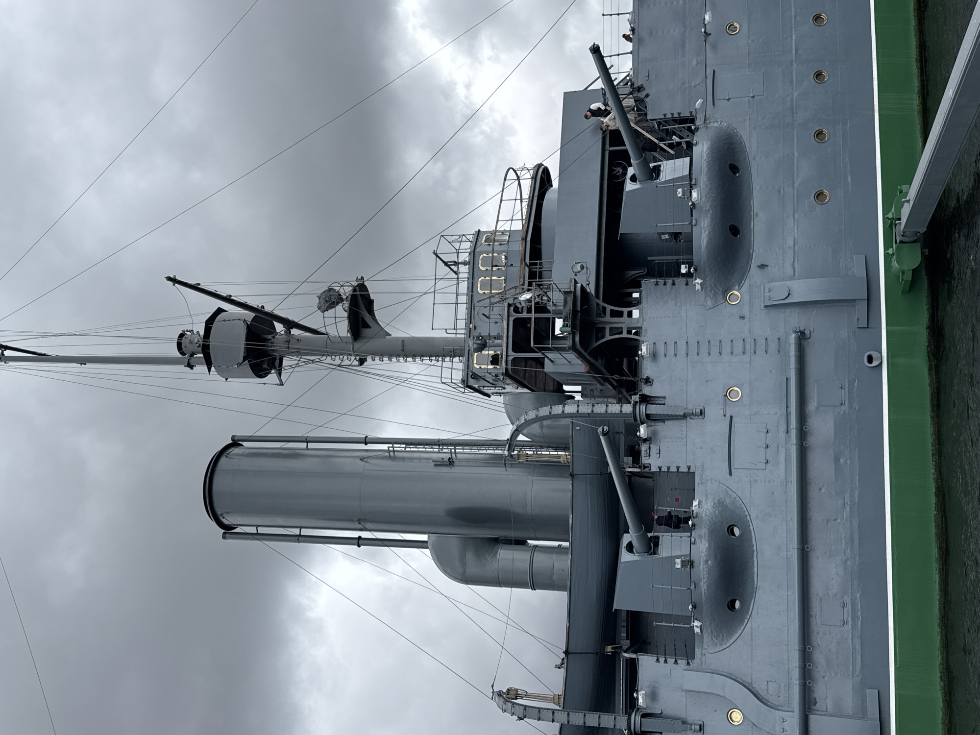 Tourists document historic Aurora cruiser museum ship in Saint Petersburg