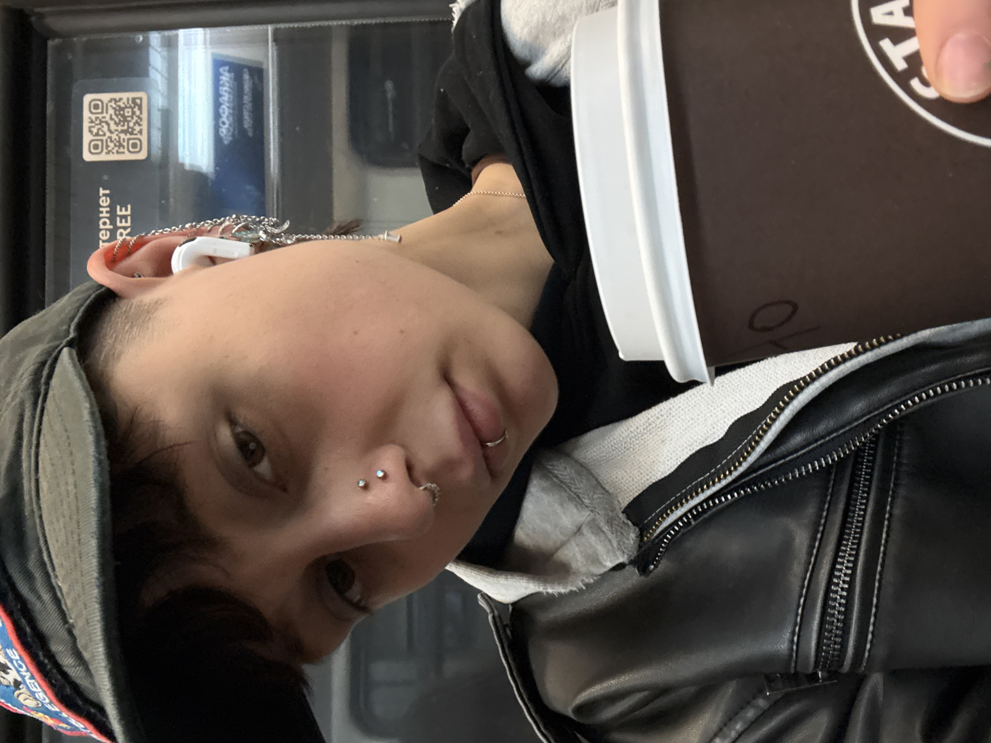 Parent and infant ride Moscow Metro during afternoon commute