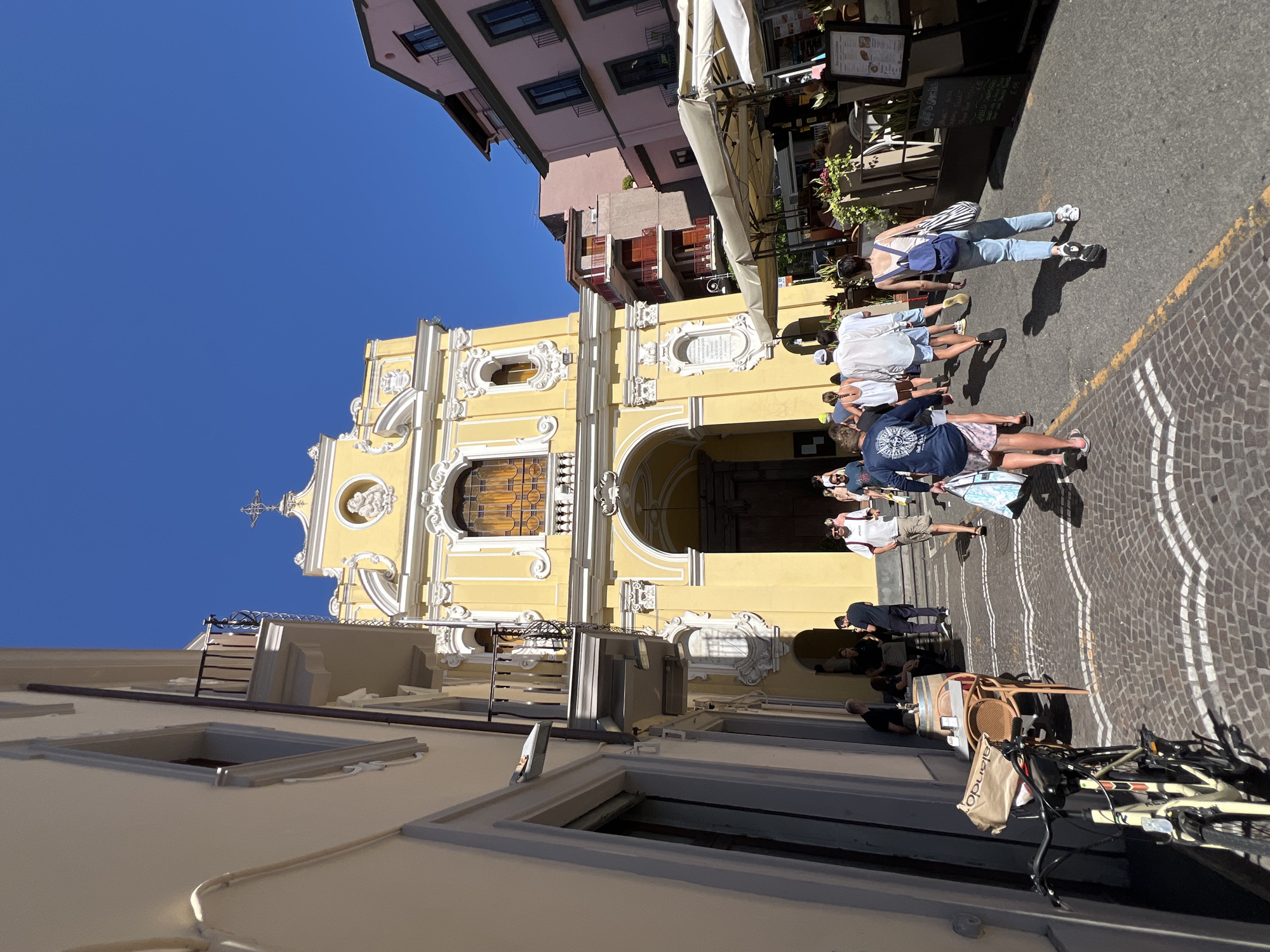 Tourist documents afternoon stroll through historic Sorrento streets
