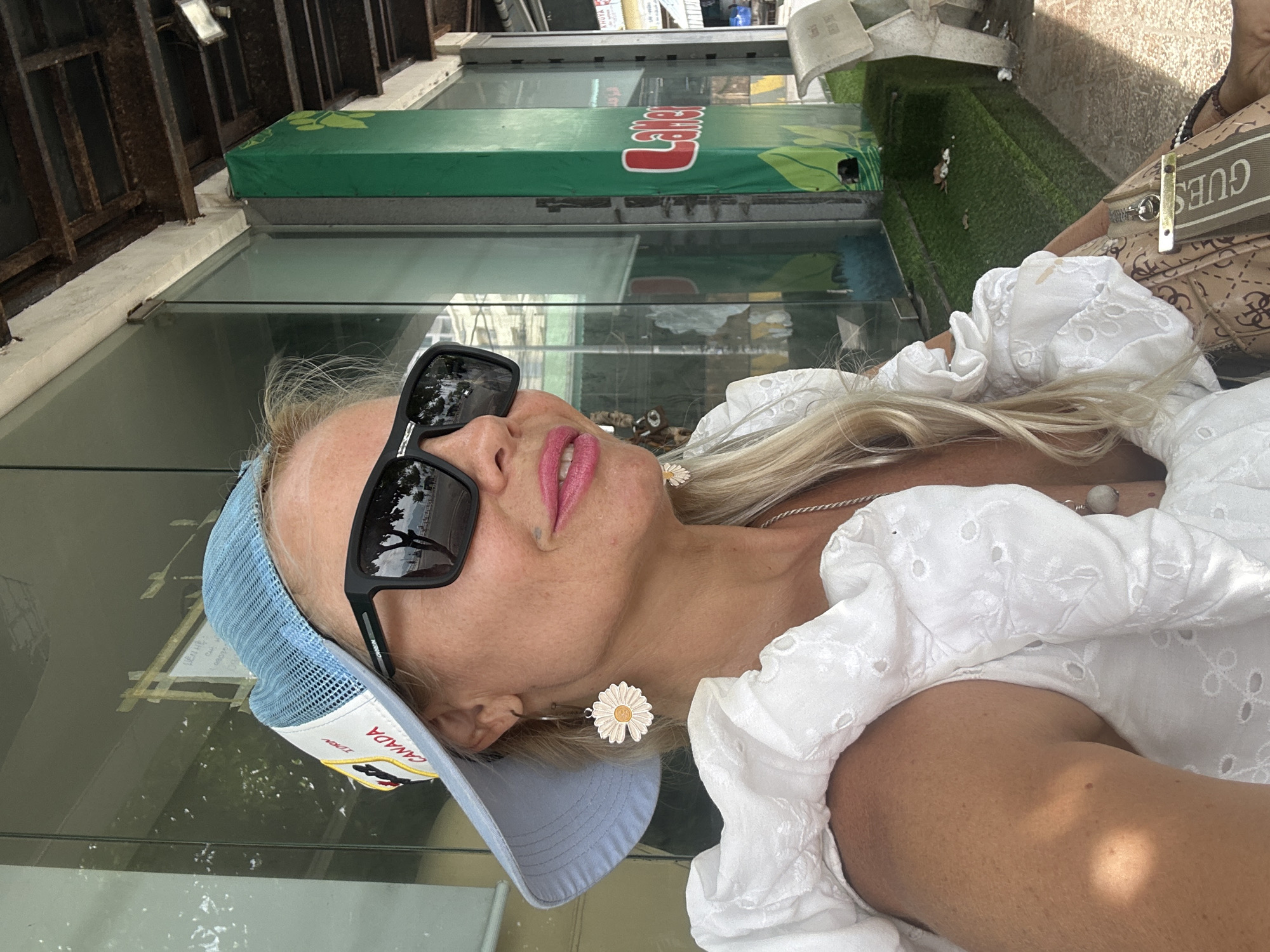 Woman in Canadian cap photographed in Vietnam