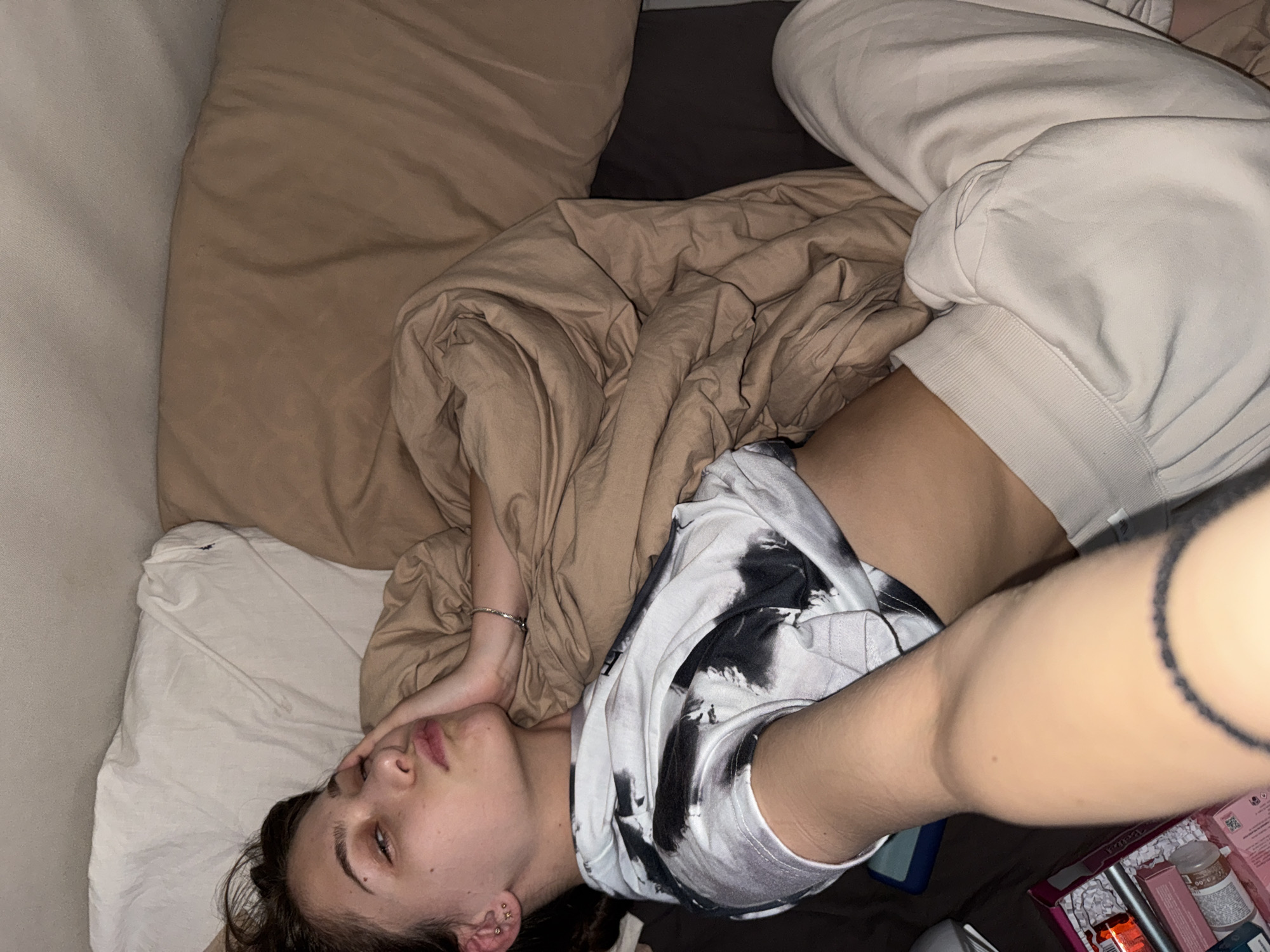 Woman resting in bedroom during afternoon in Sofia