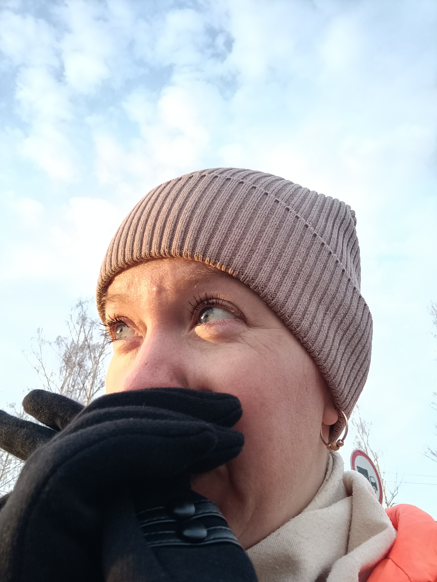 Person gazes skyward during dawn in Chaikovsky, Russia