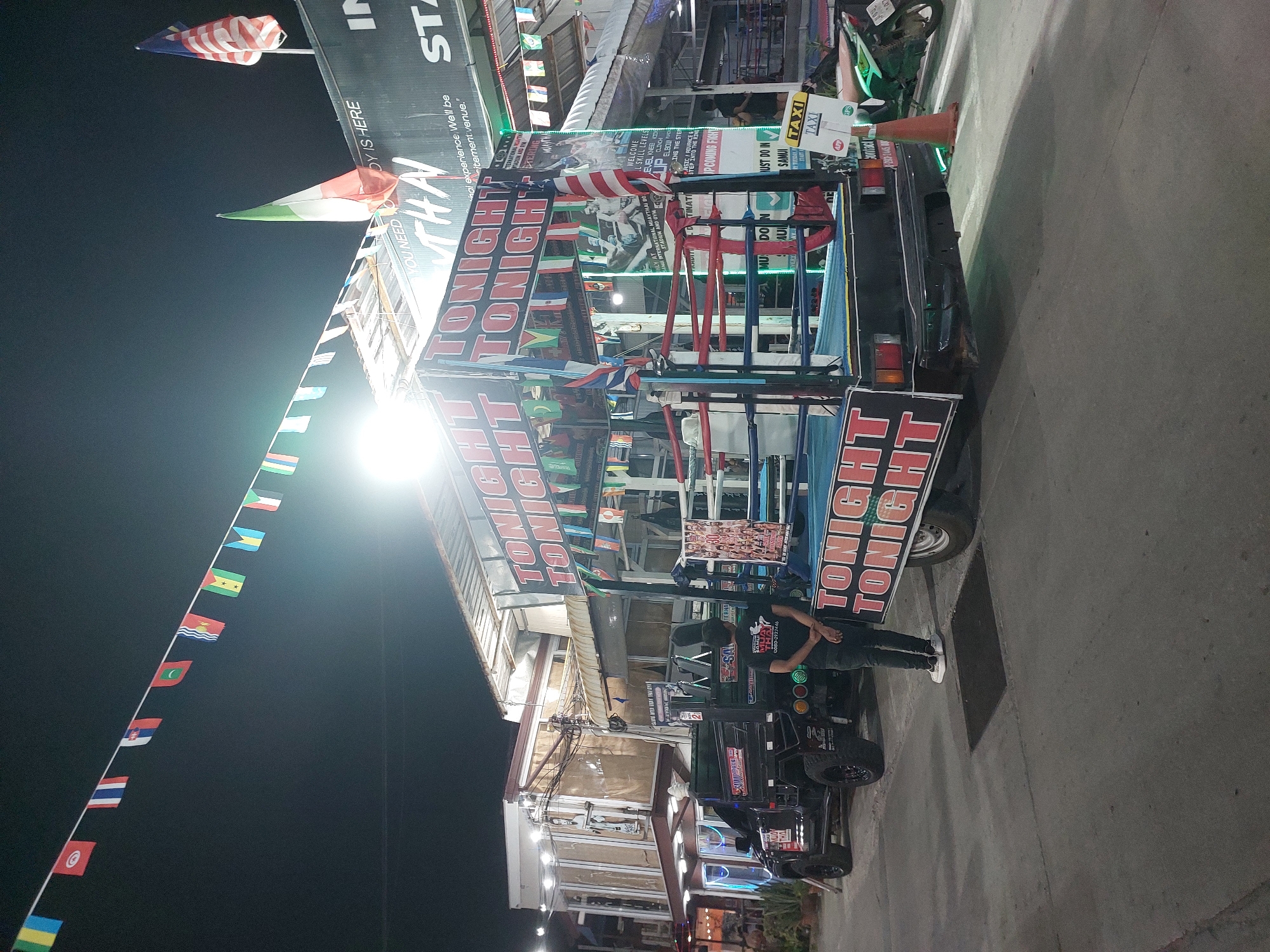 Mobile boxing ring truck rolls through Ko Samui's nightlife strip