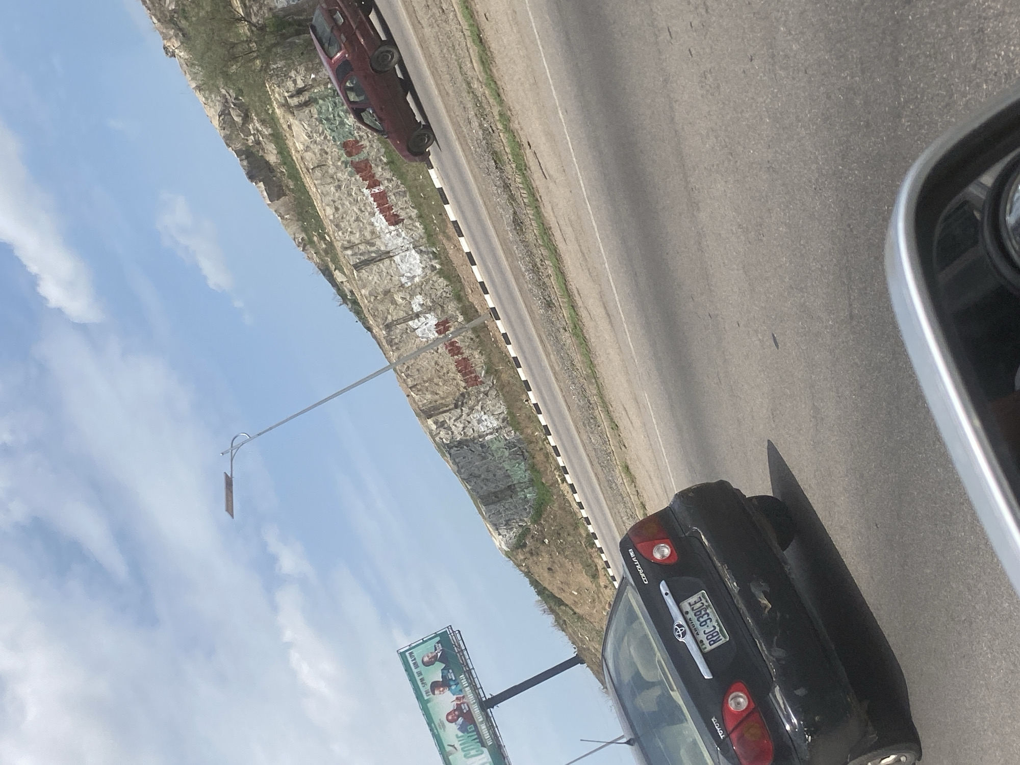 Vehicle journey captures everyday street scenes across Abuja